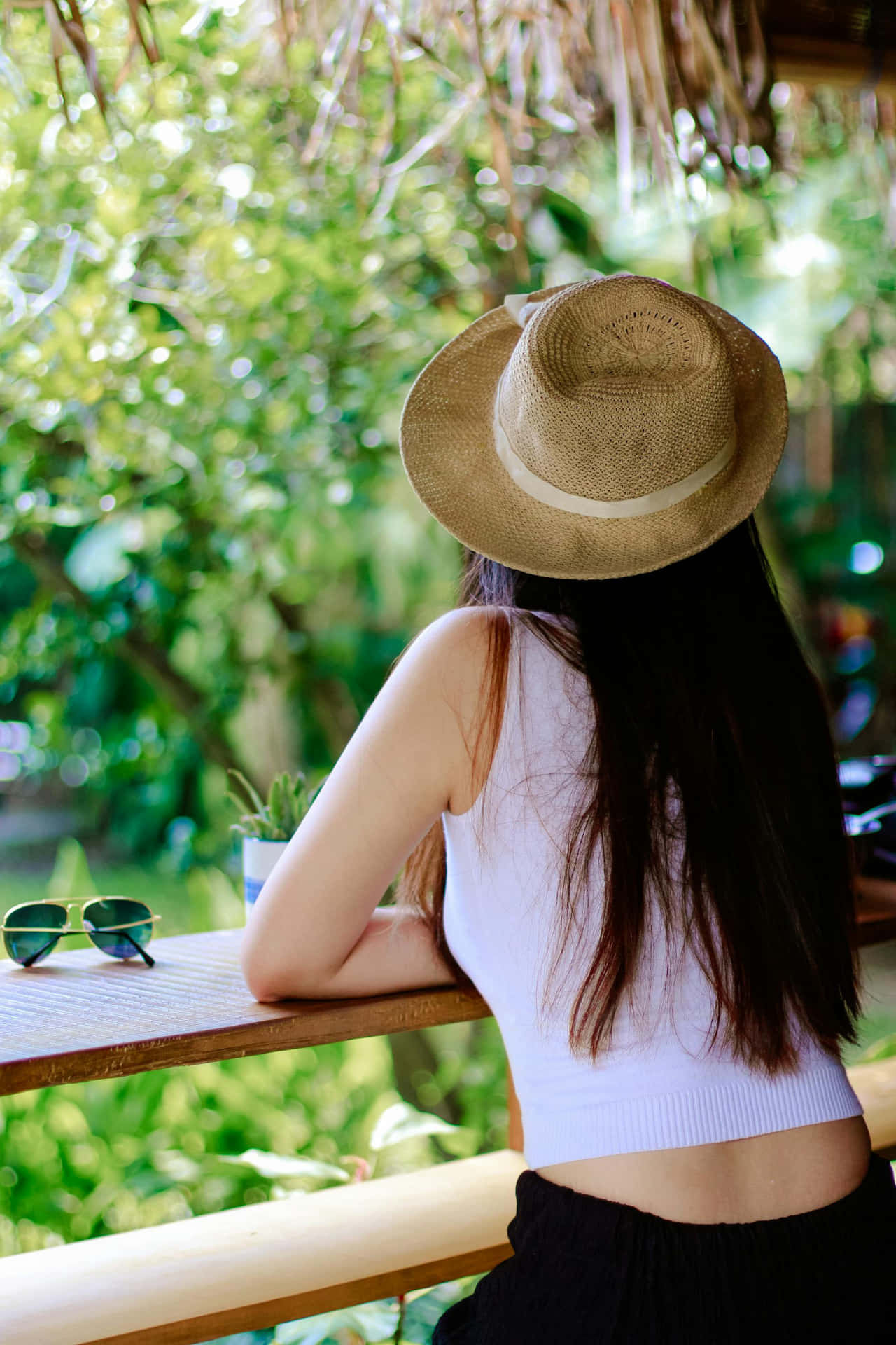 Summer Hat Girl Relaxing Outdoors.jpg Wallpaper