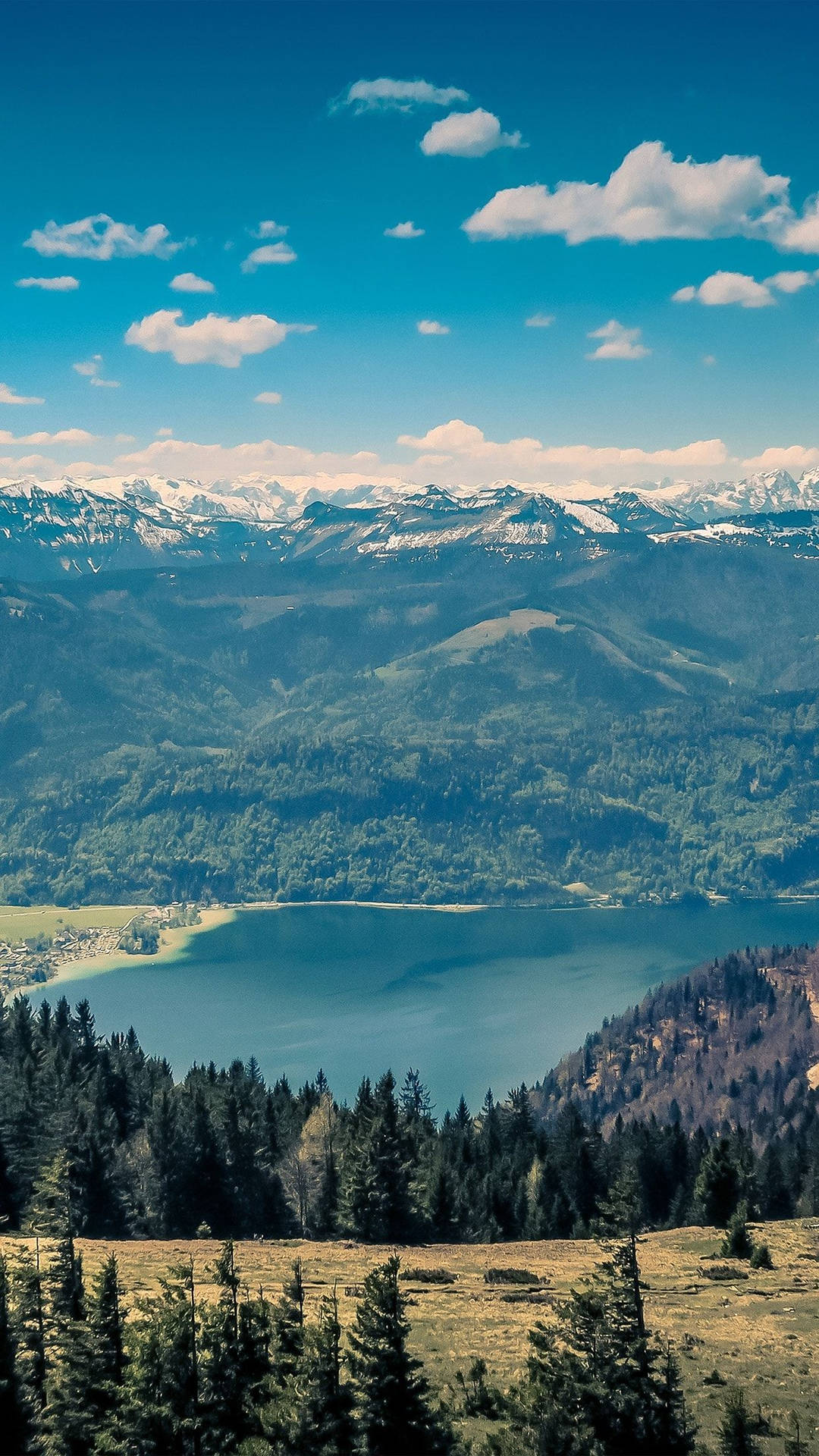 A Mountain Range With A Lake Wallpaper