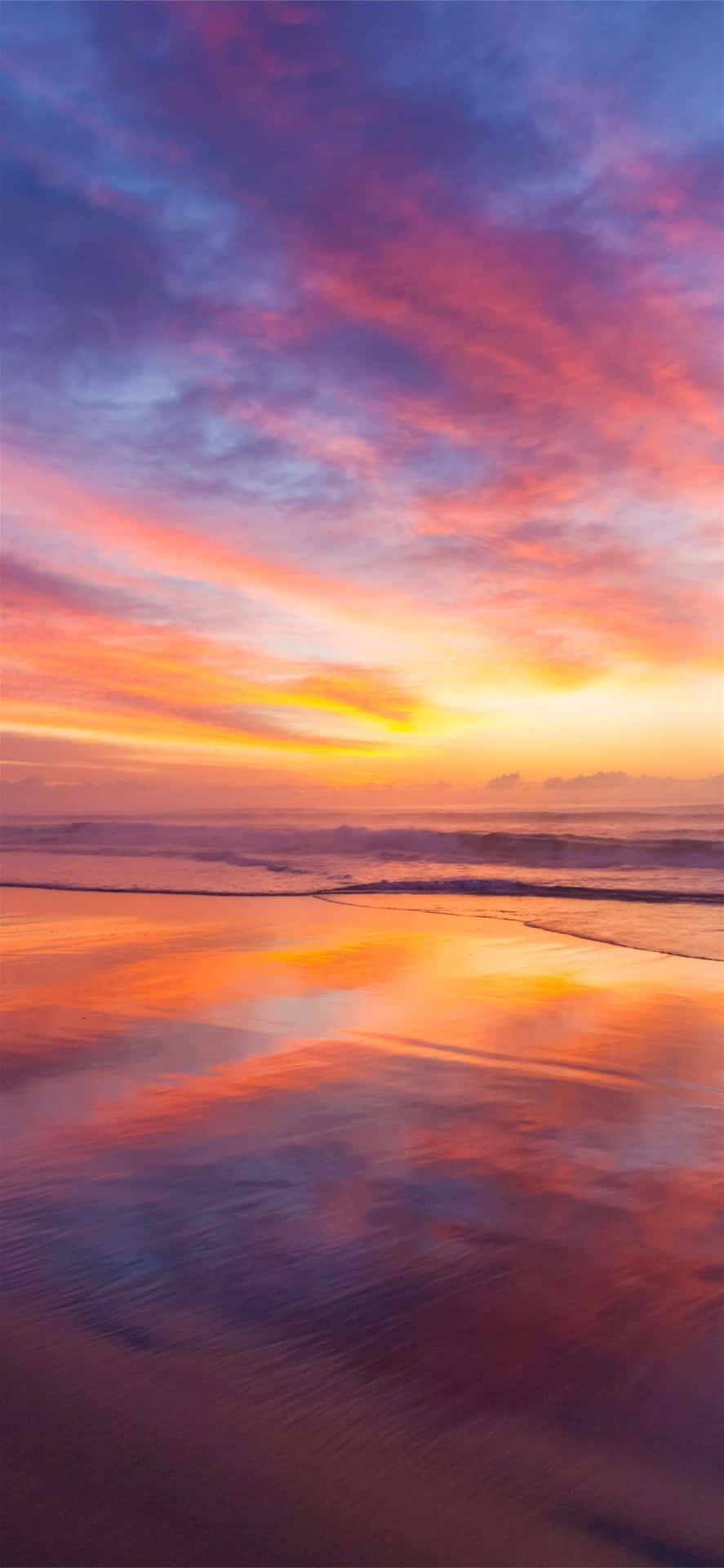 Sun Rise Over Calm Beach Wallpaper