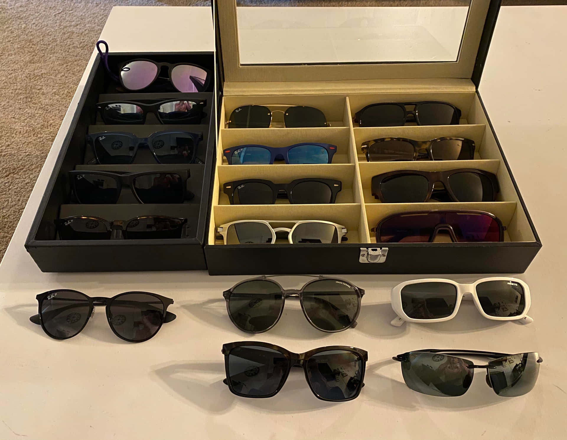 A Box Of Sunglasses With Different Styles Of Sunglasses
