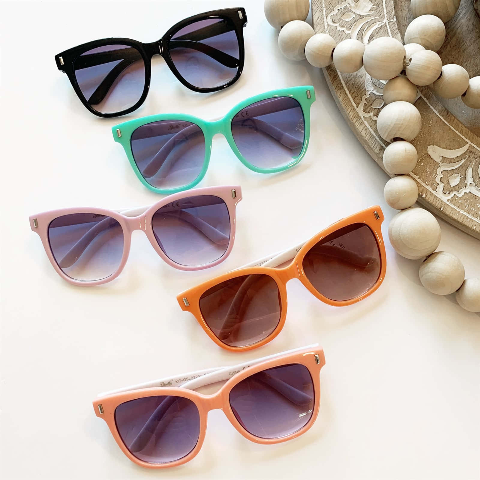 A Group Of Sunglasses With Different Colors And Beads