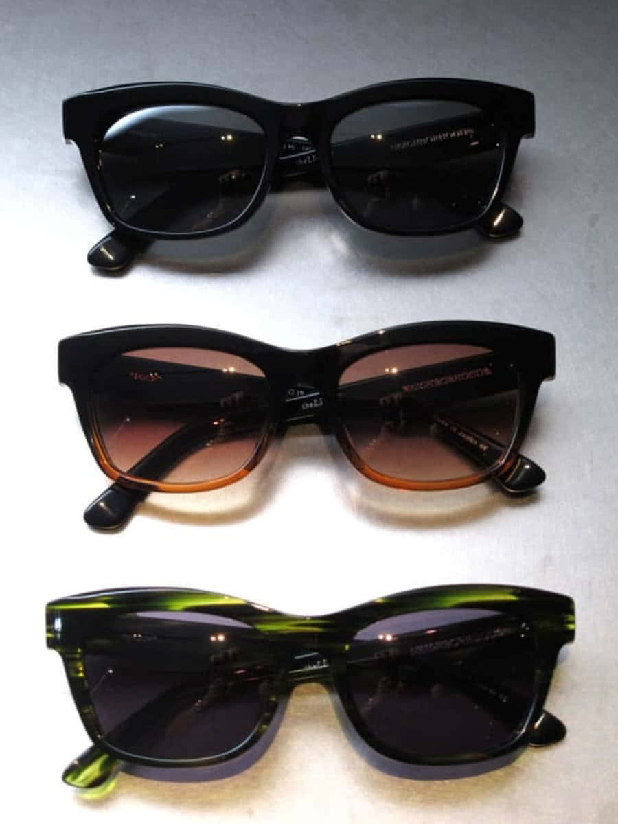 A Pair Of Sunglasses With Different Colors And Styles