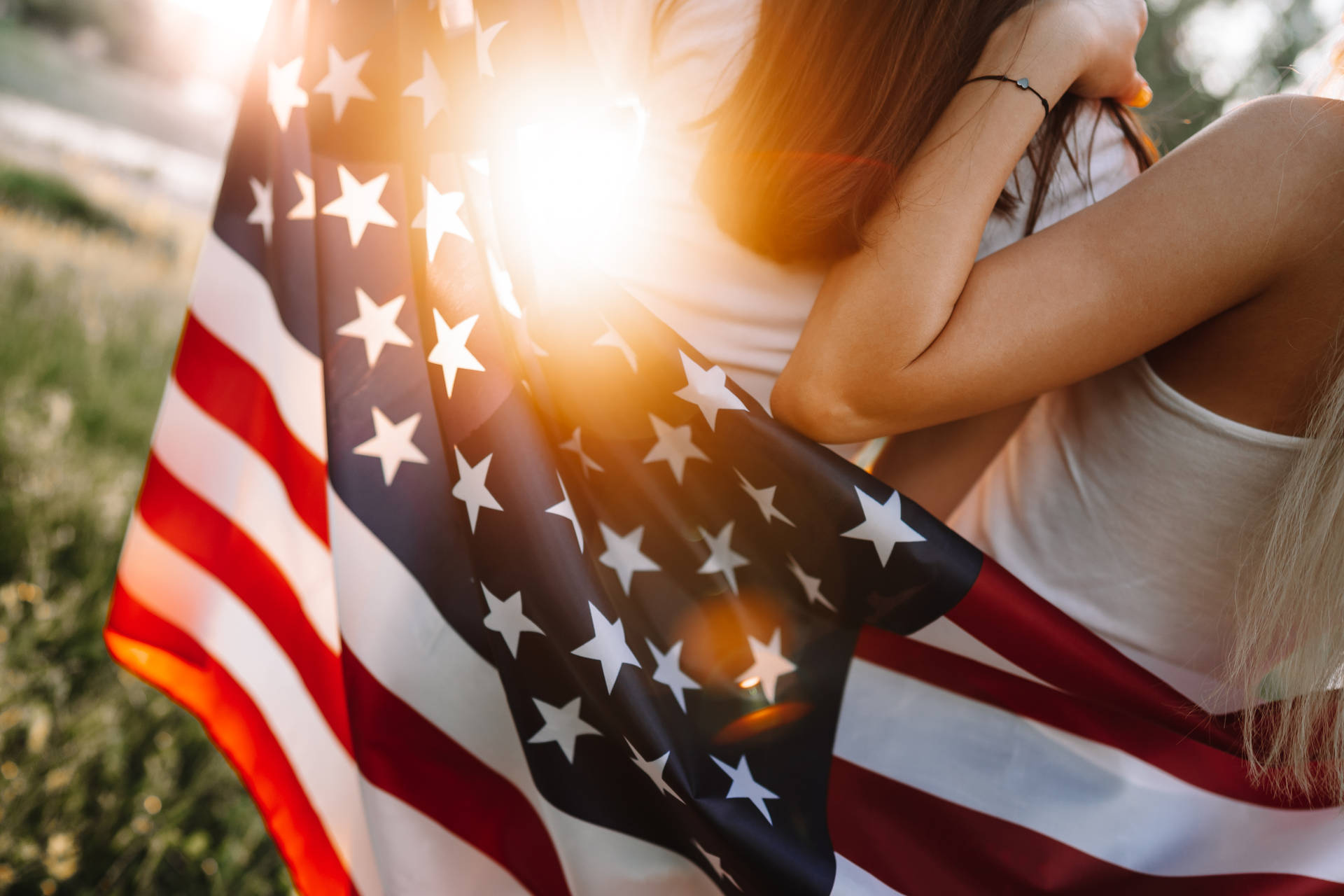 Download Sunlight Striking Usa Flag Iphone Wallpaper | Wallpapers.com