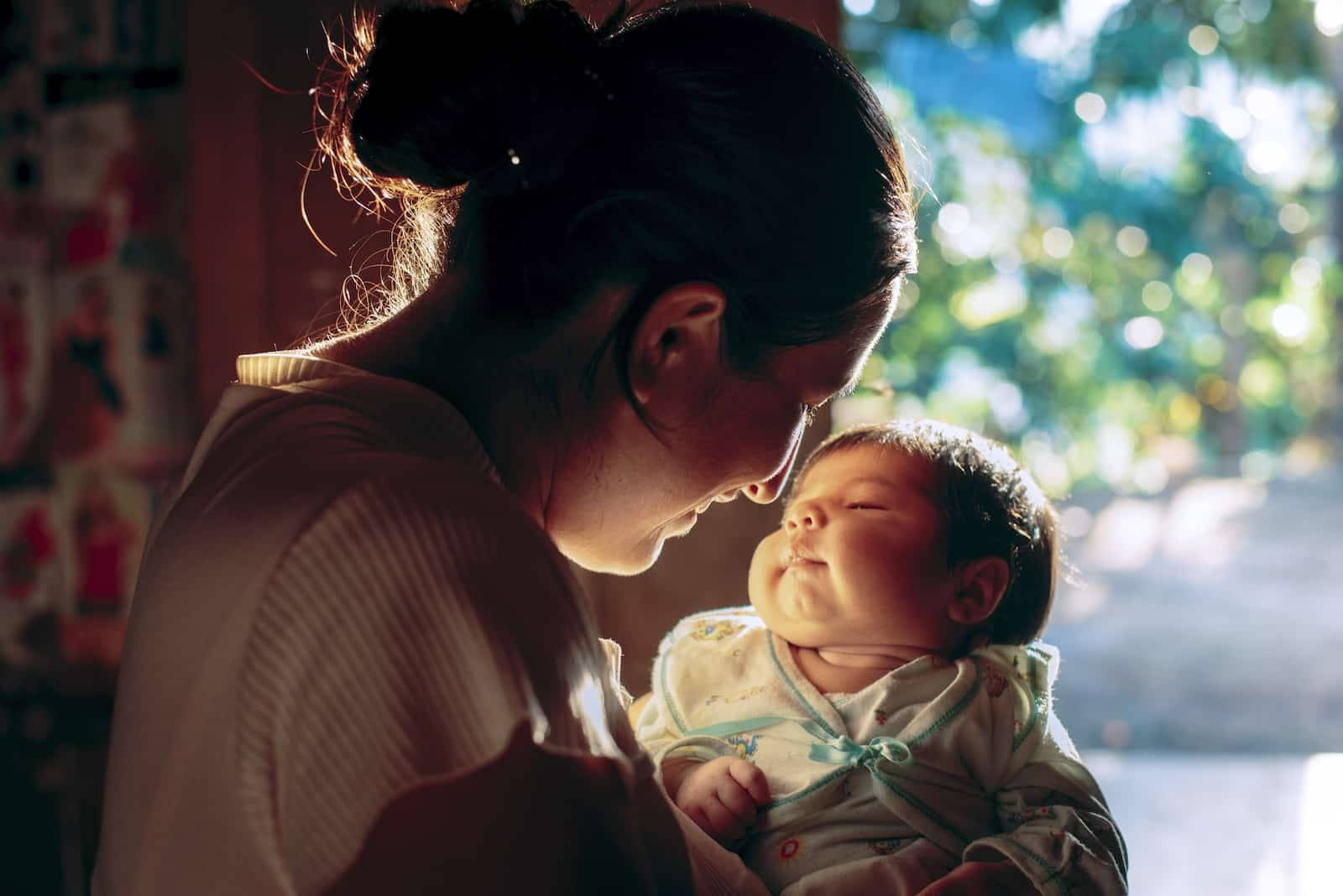 Sunlit Mother And Baby Wallpaper