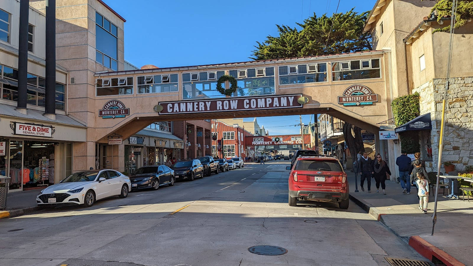 Sunny Cannery Row With Cars Wallpaper