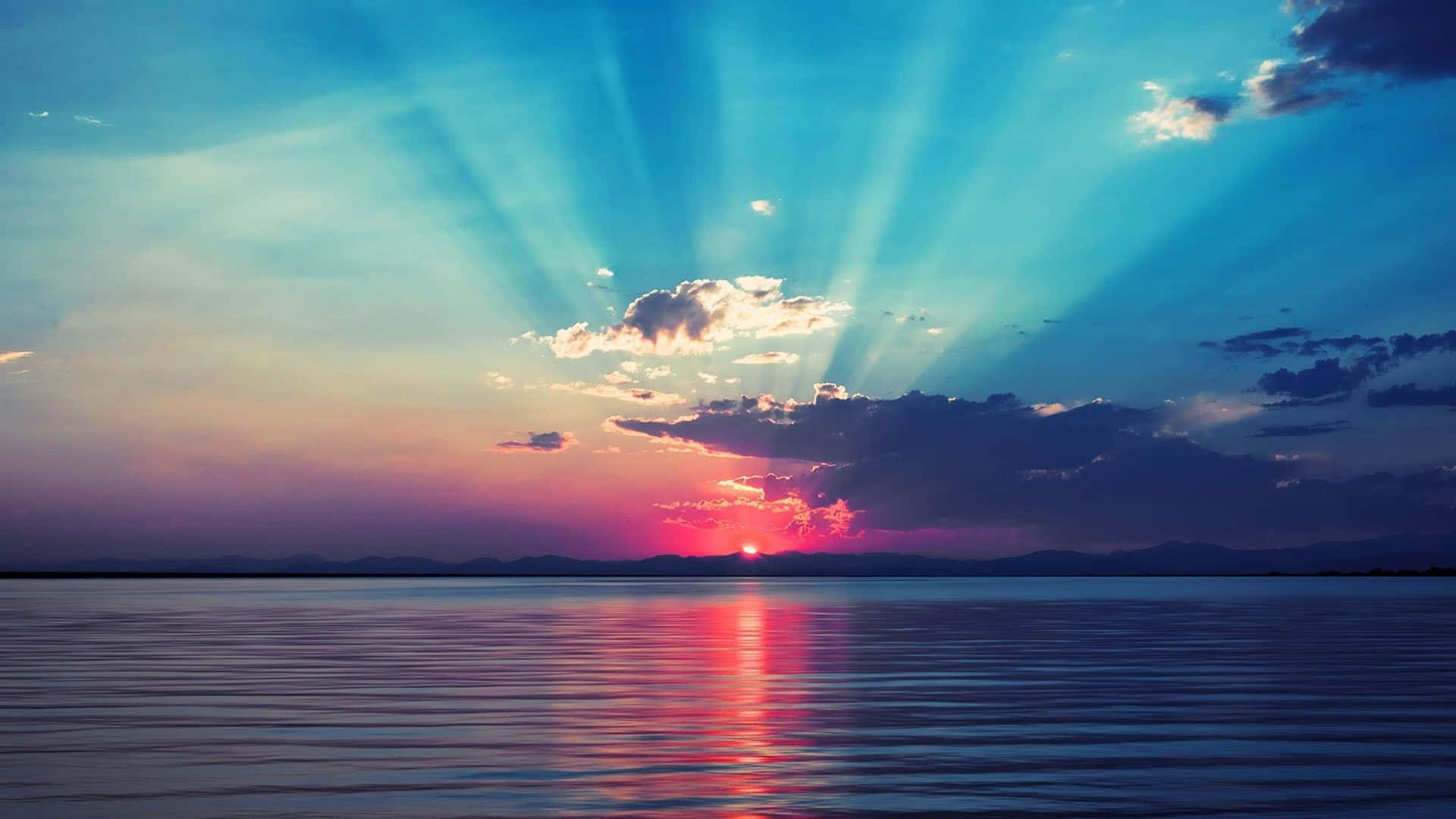 Enjoy a beautiful sunrise from your desktop Wallpaper