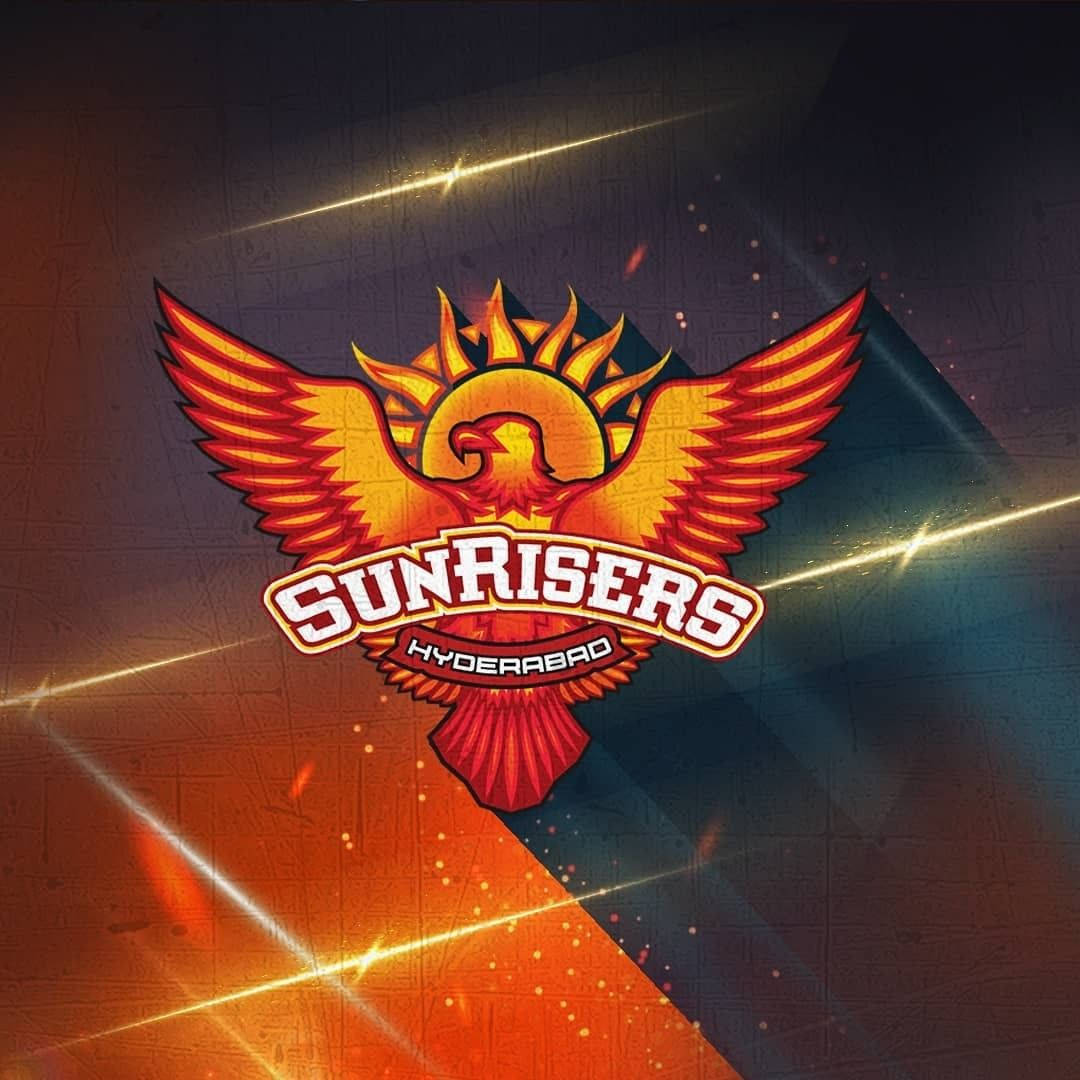 Sunrisers Hyderabad Logo With Golden Lights Wallpaper