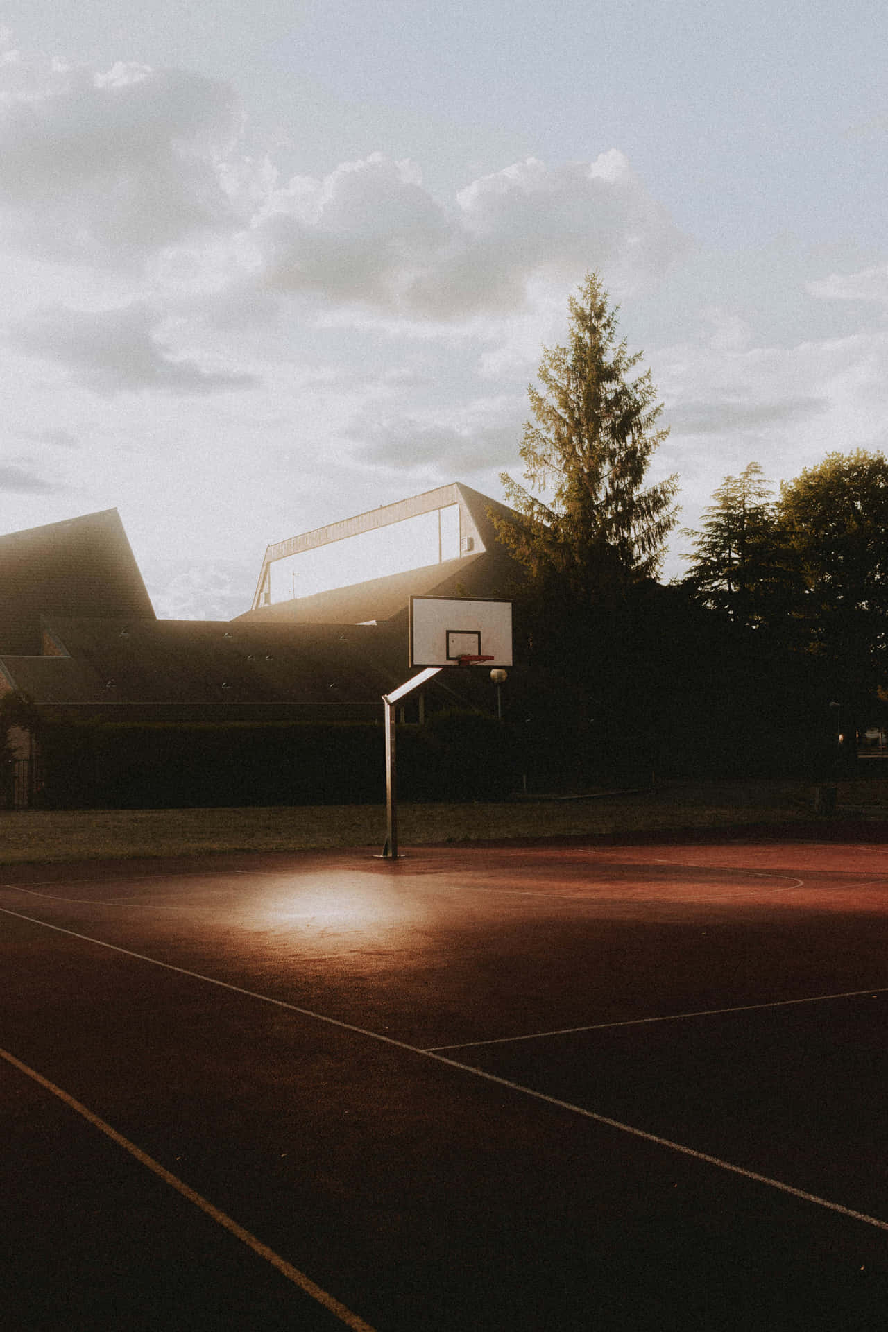 Sunset Basketball Court Glow Wallpaper