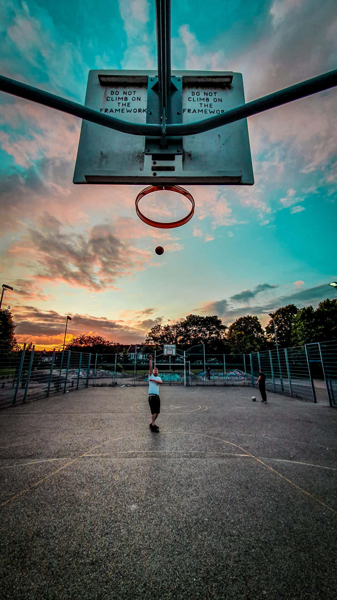 Sunset Basketball Game Action Wallpaper