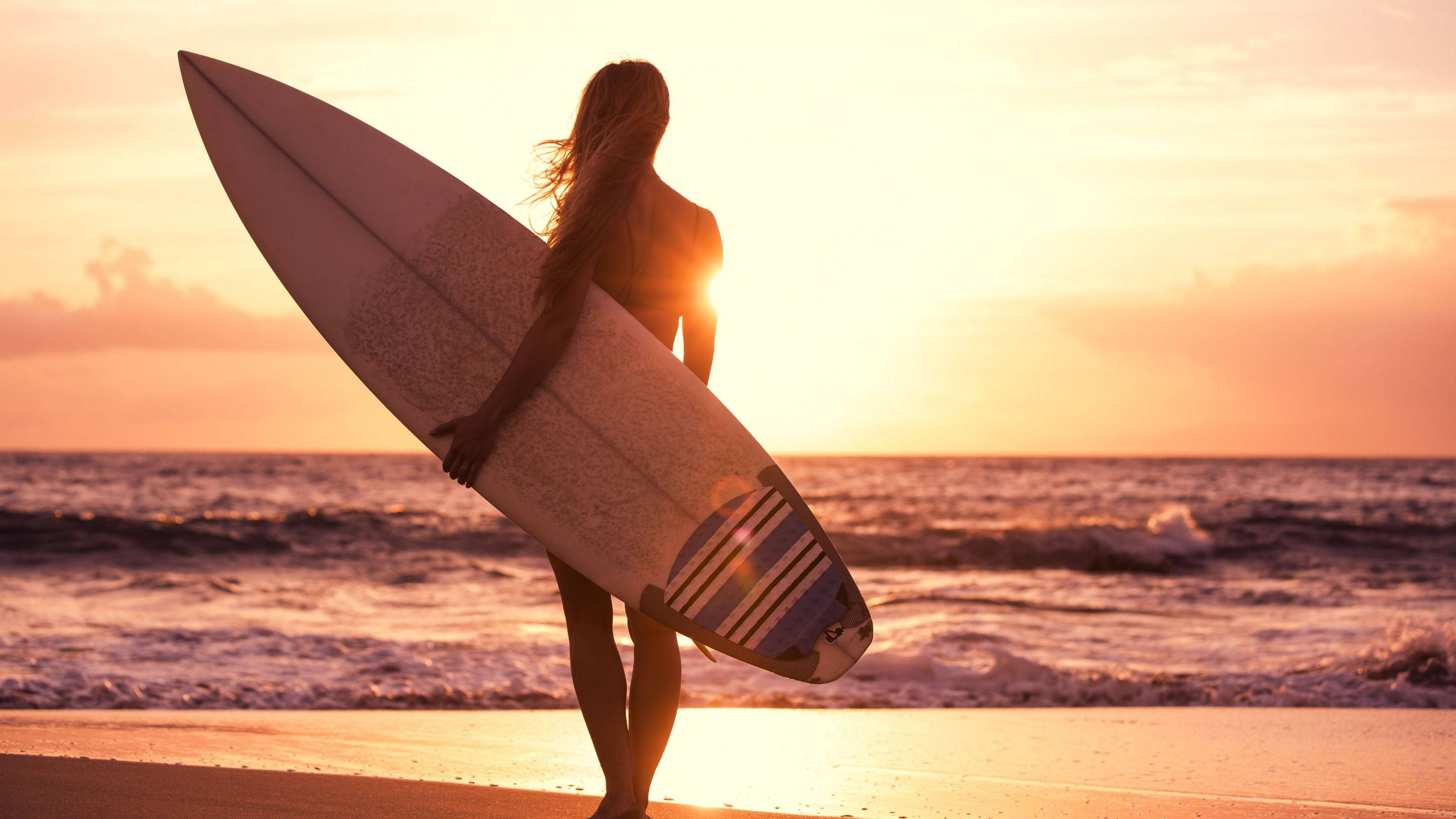 Sunset Beach Girl With Surfboard Wallpaper