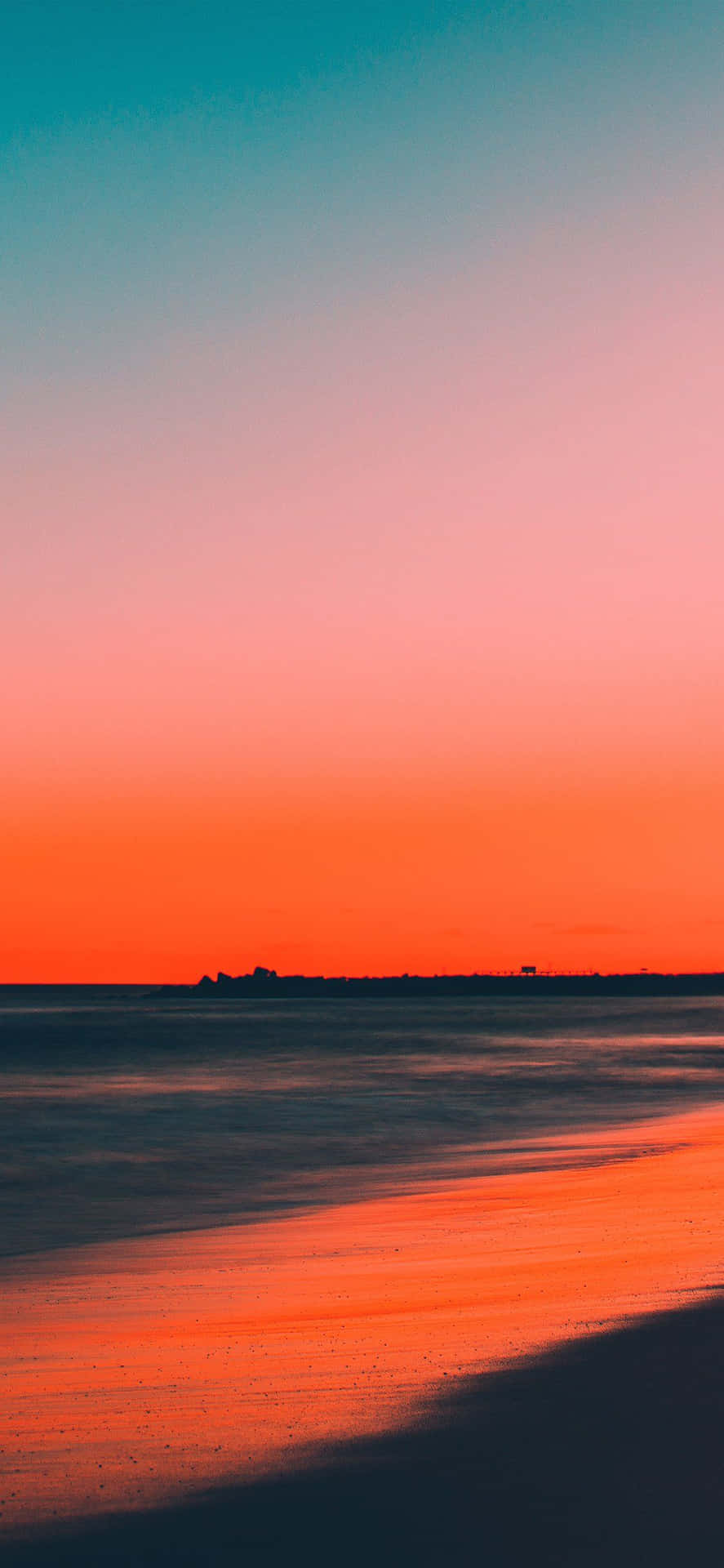 "Experience the serenity of a sunset beach view with your iPhone" Wallpaper