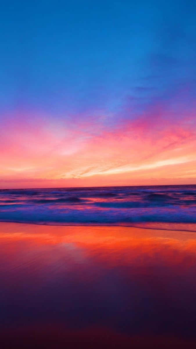 "Embrace the beauty of the golden hour at Sunset Beach" Wallpaper
