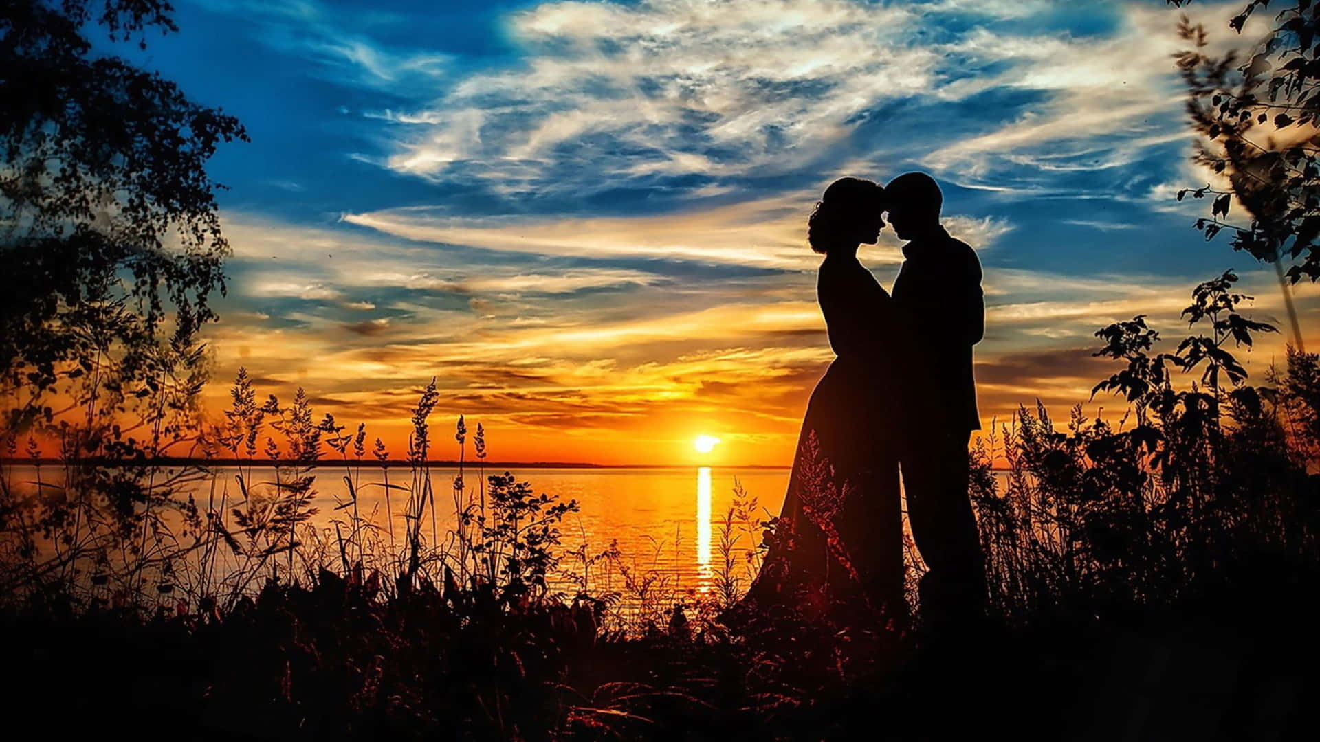 Sunset Couple Lake Wallpaper