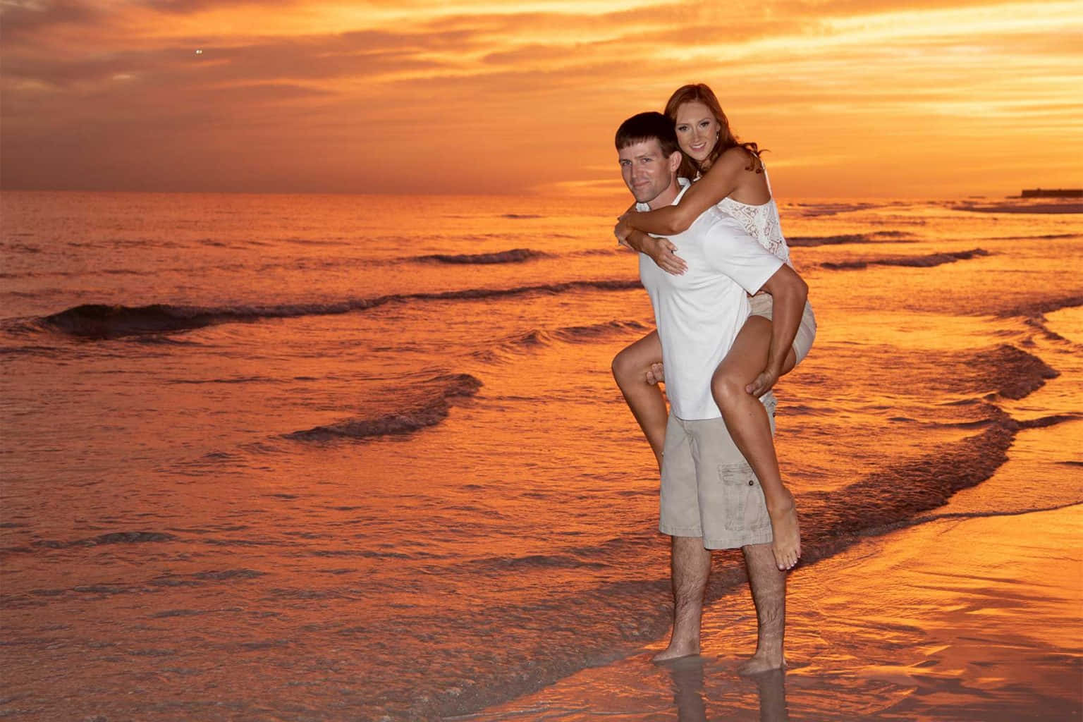Sunset Couple Picture Piggy Back Ride