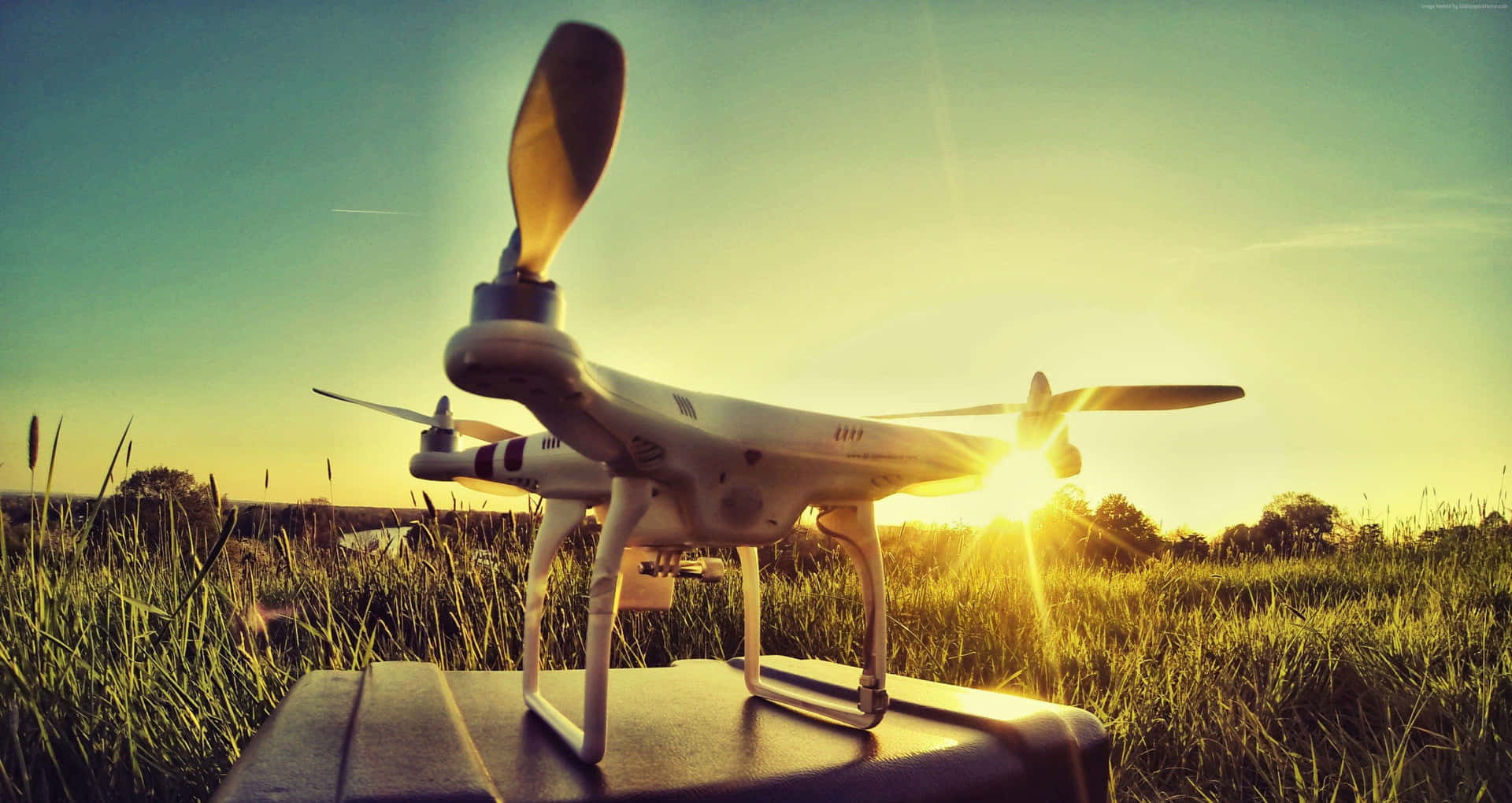 Sunset Drone Readyfor Flight Wallpaper