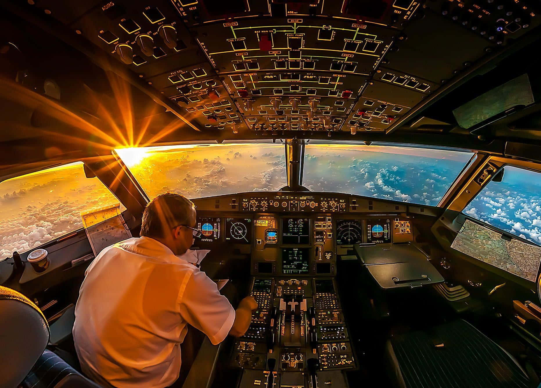 Sunset Flight Cockpit View Wallpaper
