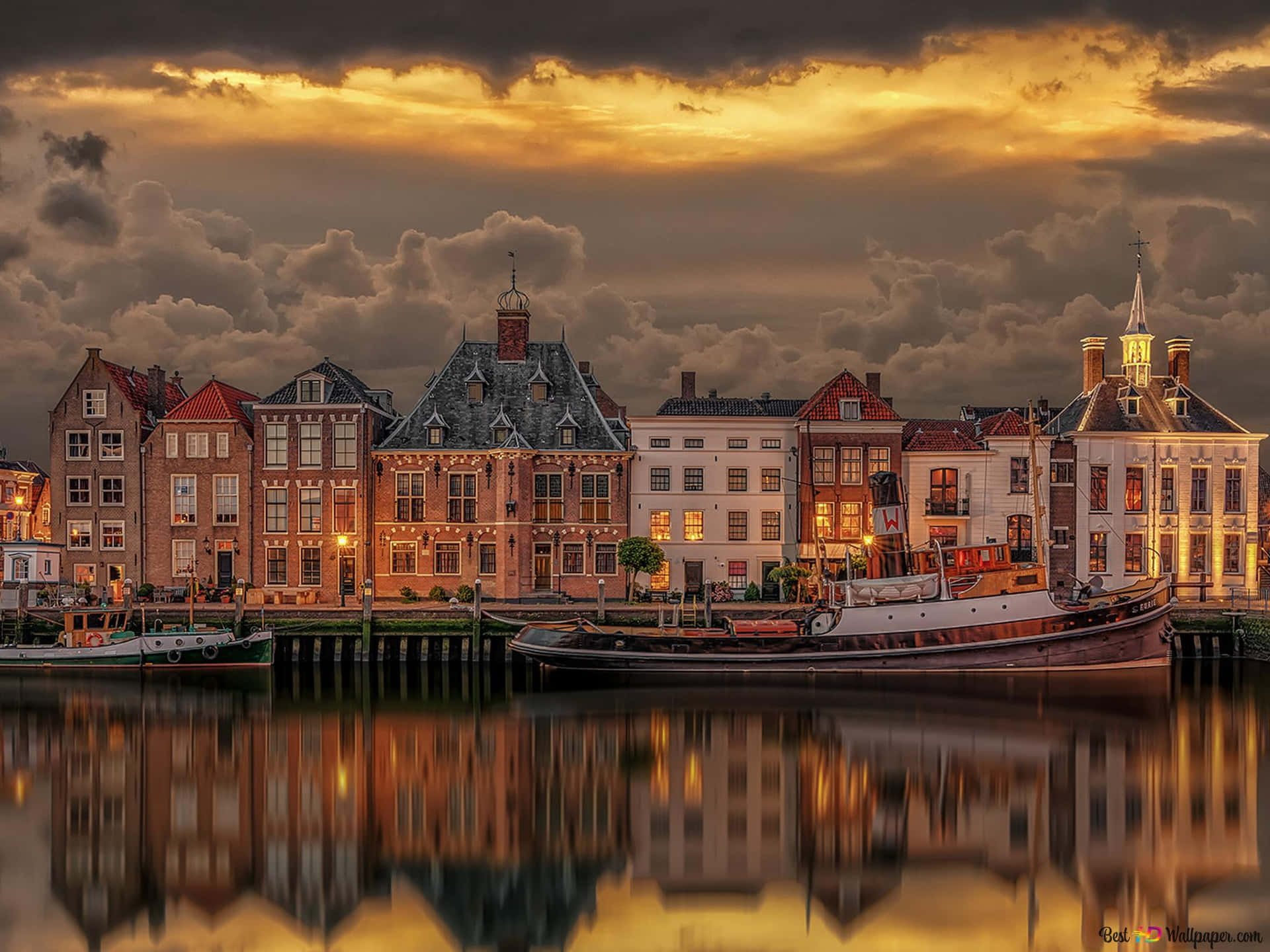 Sunset Glow Over Hengelo Canal Houses Wallpaper