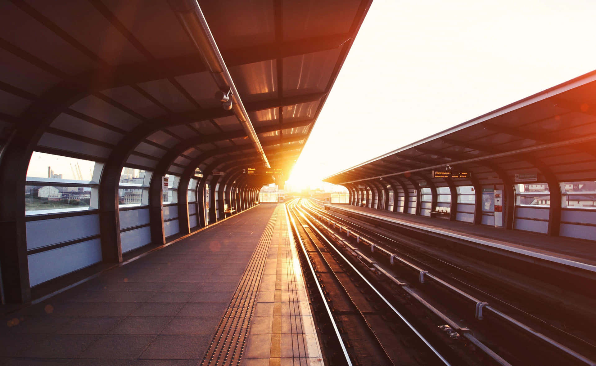 Sunset Glow Train Station Platform Wallpaper