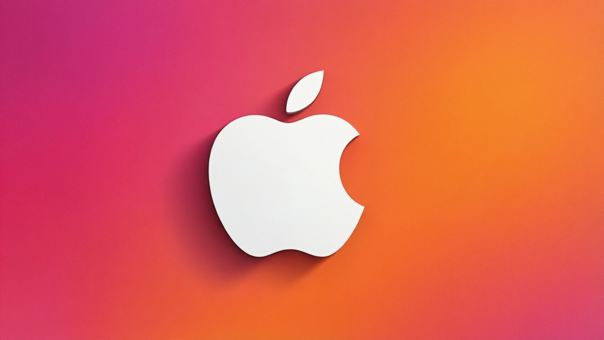 Weißes Apple-Logo auf pinkem bis orangem Farbverlaufshintergrund.