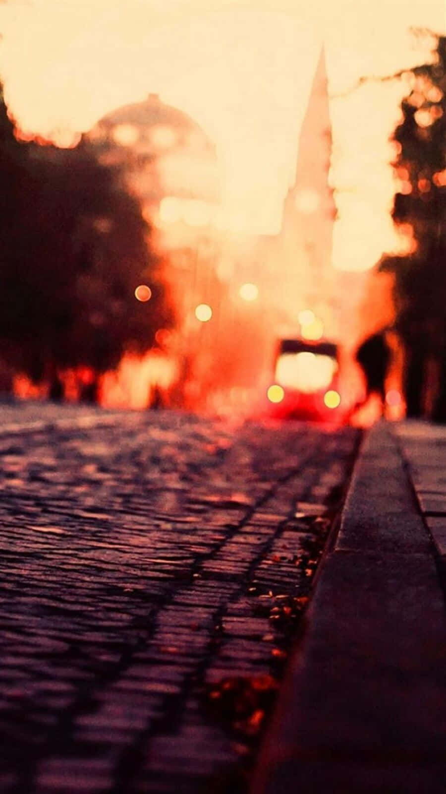 Sunset Hued Cityscape Blur Wallpaper