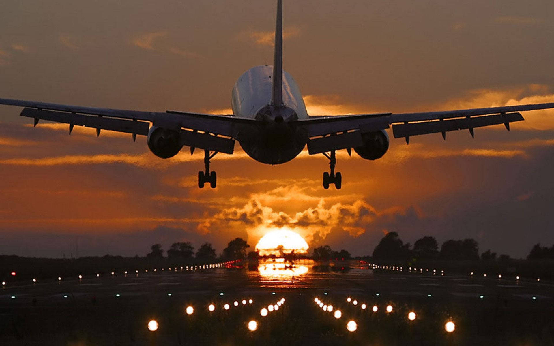 Sunset Landing Airplane
