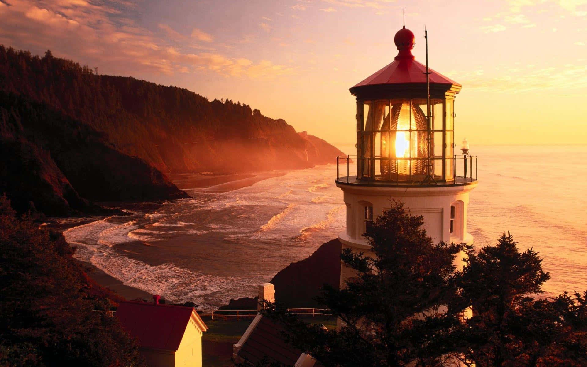 Sunset Lighthouse Coastline Glow Wallpaper