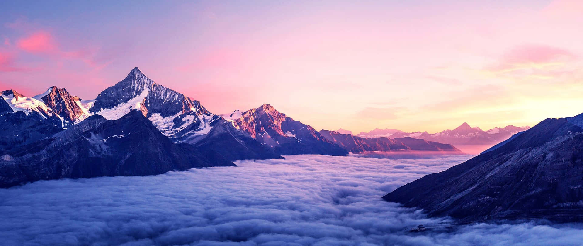 Sunset_ Mountain_ Peaks_ Above_ Clouds.jpg Wallpaper