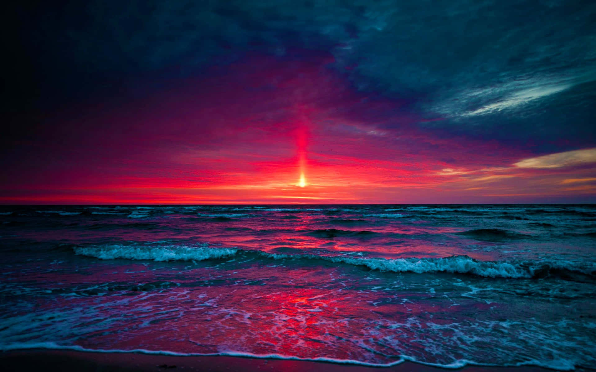 Serene Sunset Over Ocean Waves