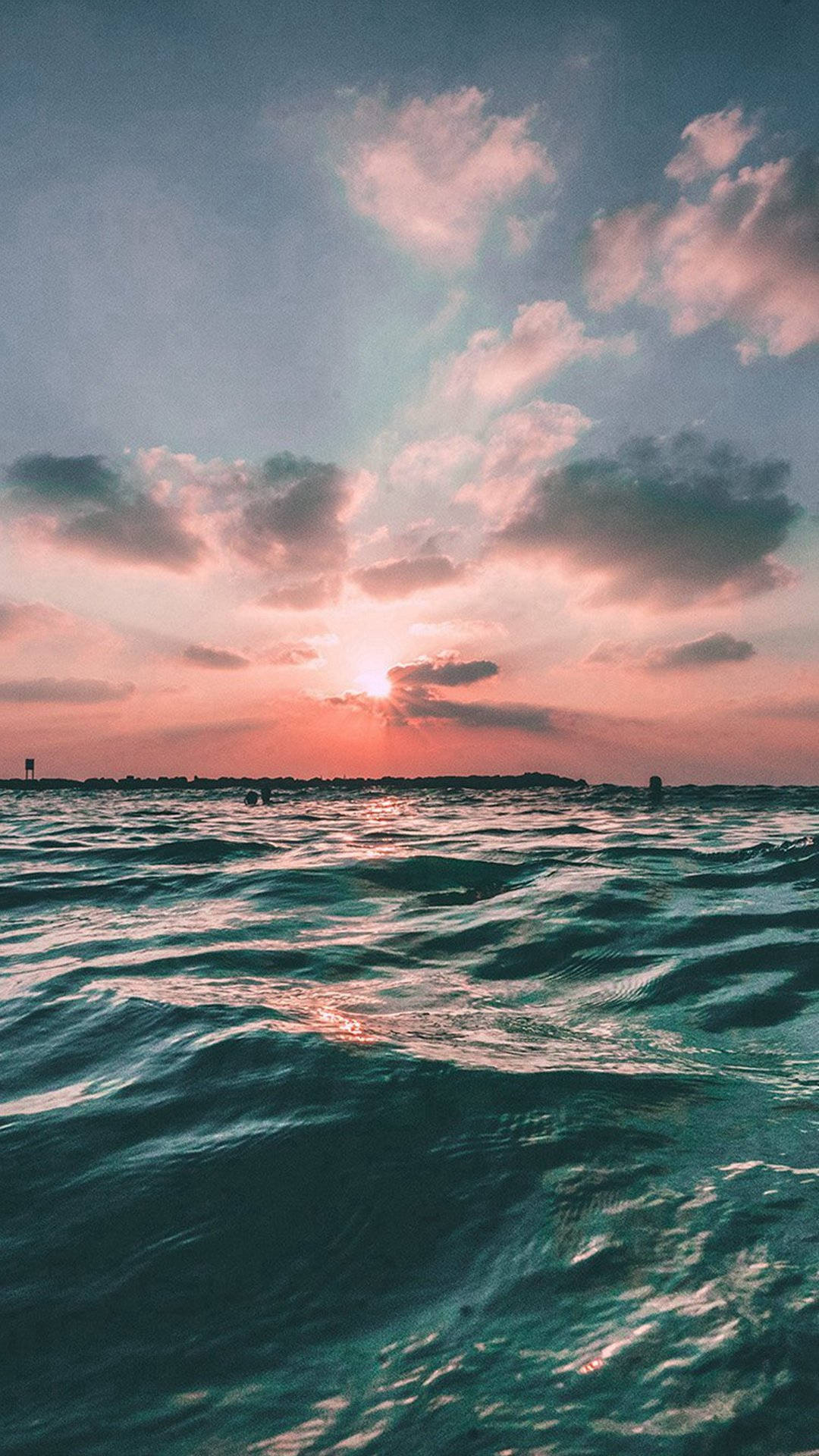 Sonnenuntergangauf Dem Ozean Wallpaper