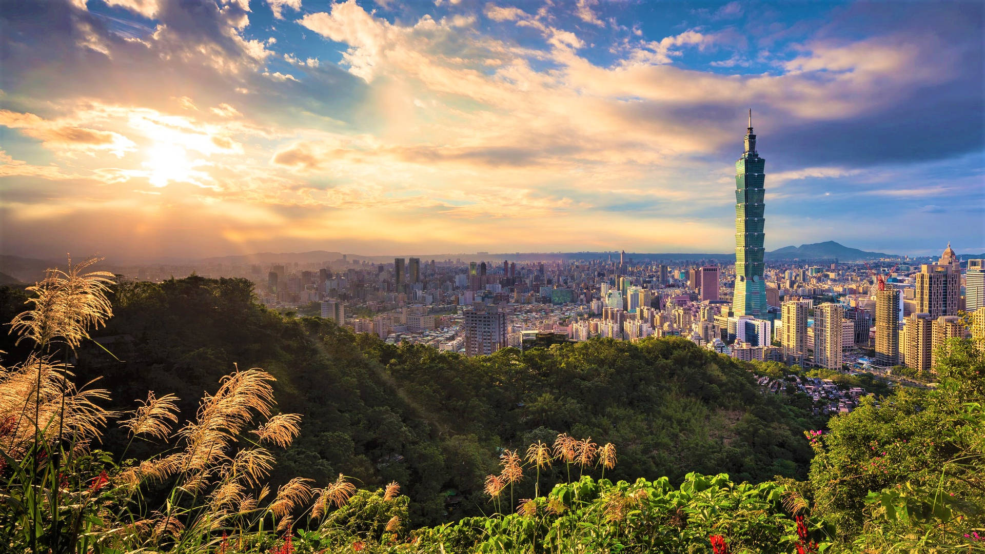 Solnedgångöver Taipeis Stad Wallpaper