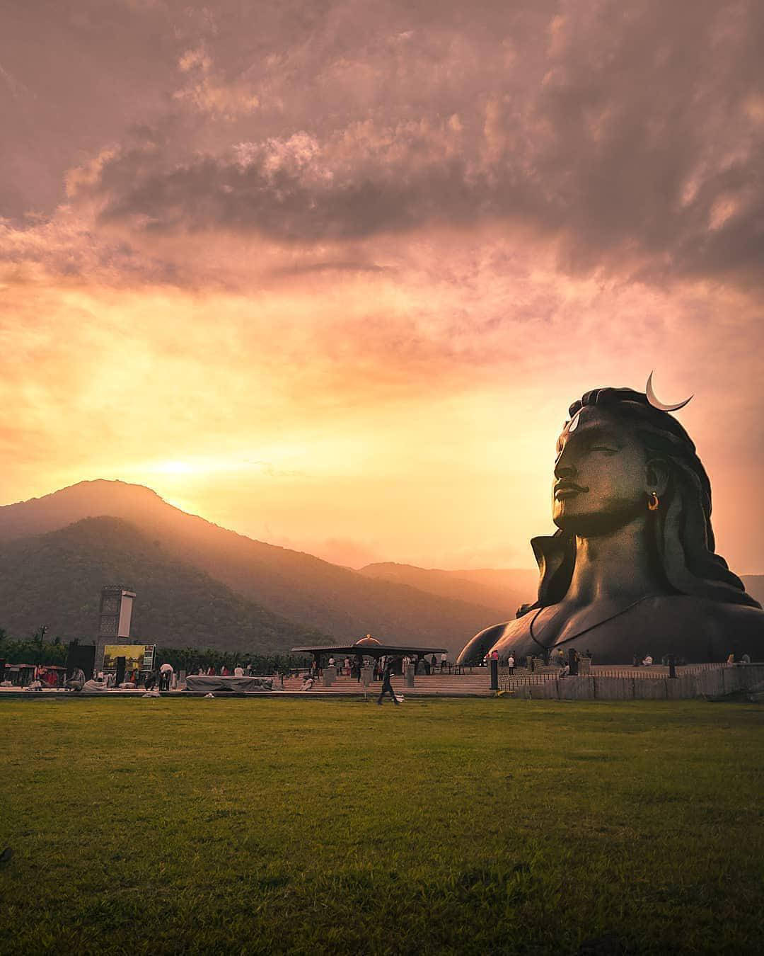 Solnedgang Over Adiyogi Shiva-statuen Wallpaper