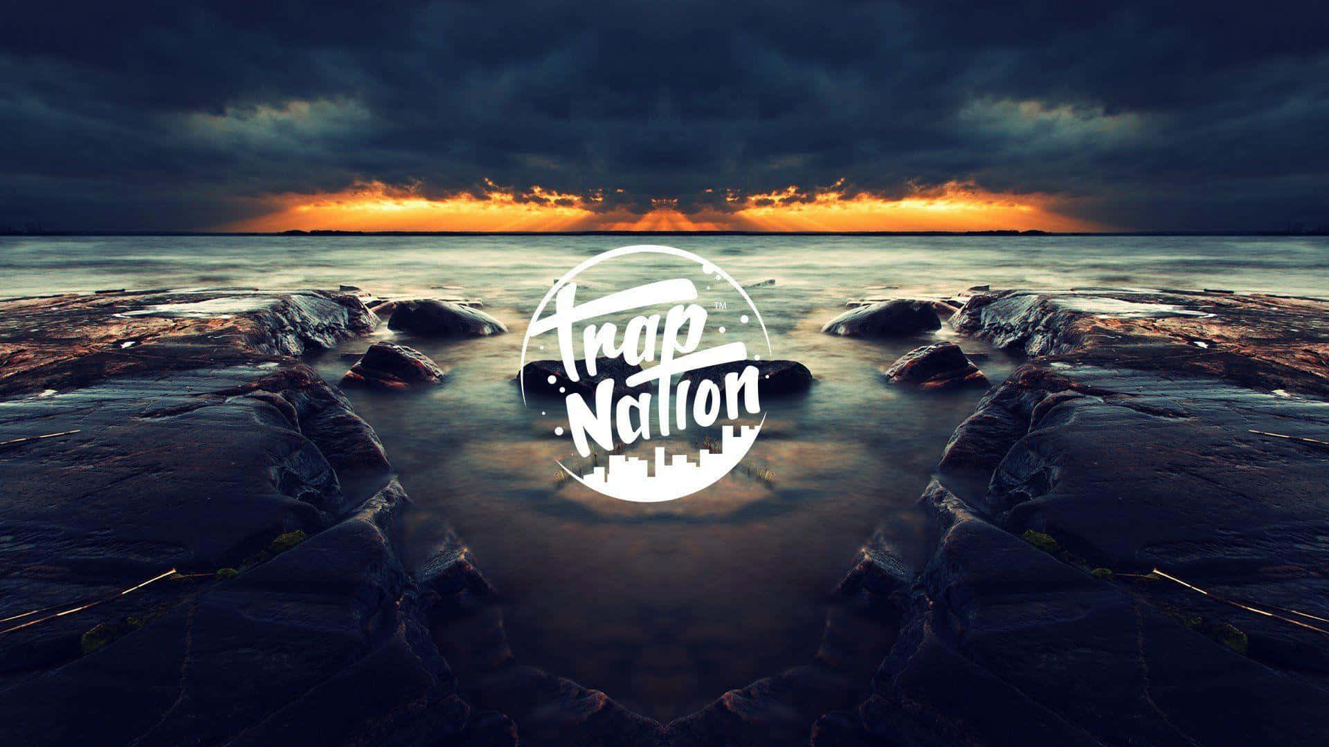 Sunset Over Waterwith Trap Nation Logo Wallpaper