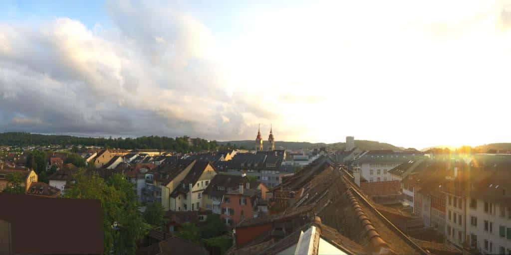 Sunset Over Winterthur Rooftops Wallpaper