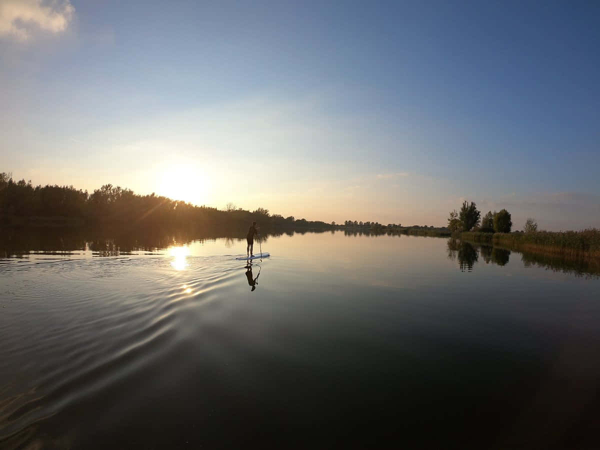 Solnedgang Paddleboarding I Terneuzen Bakgrunnsbildet