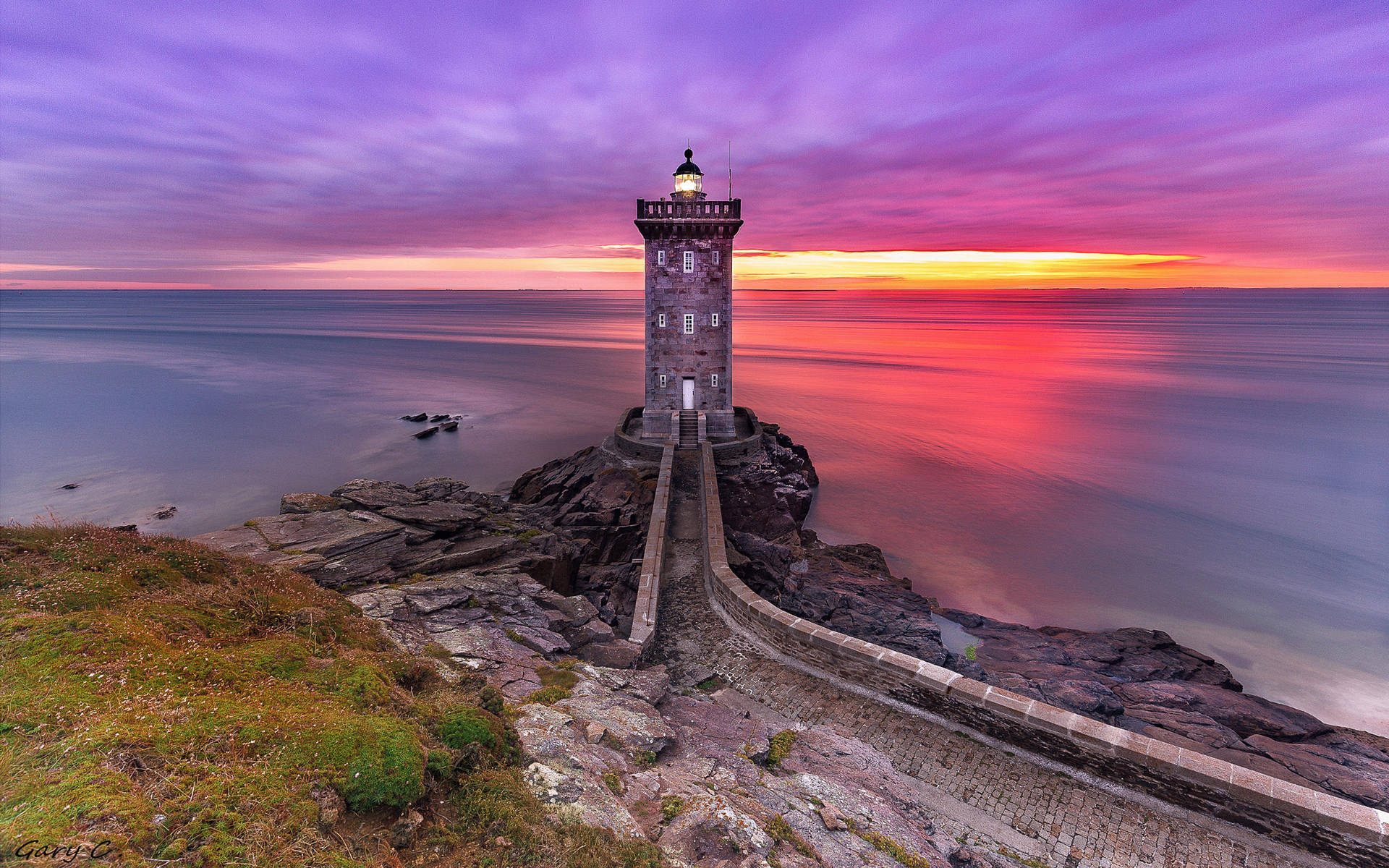 Sunset Path To Lighthouse Wallpaper
