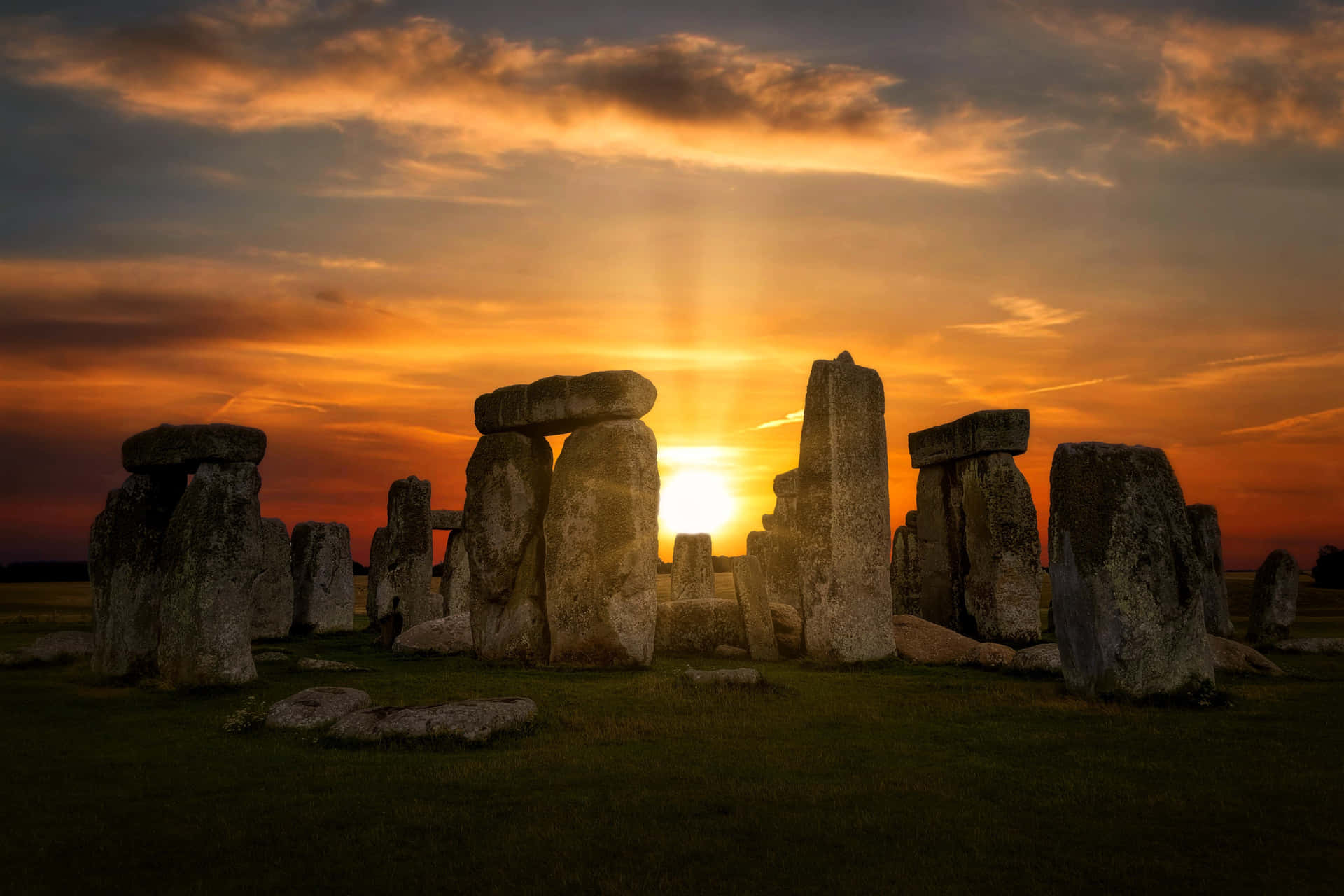 Sunset Peeks Through Stonehenge Picture