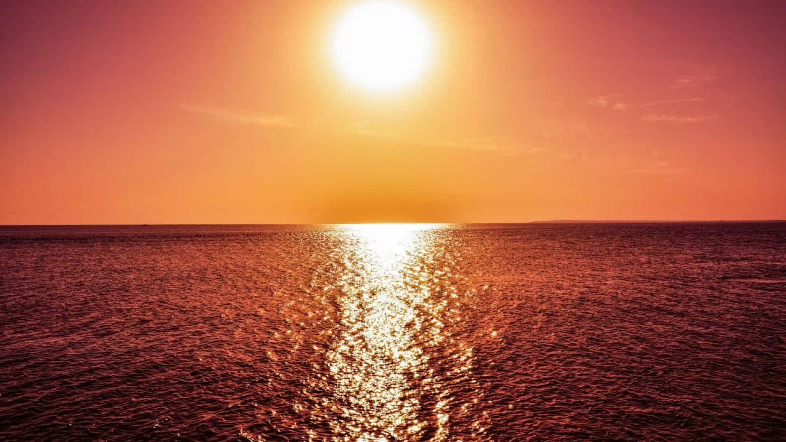 Majestic Sunset Reflection on a Calm Lake Wallpaper