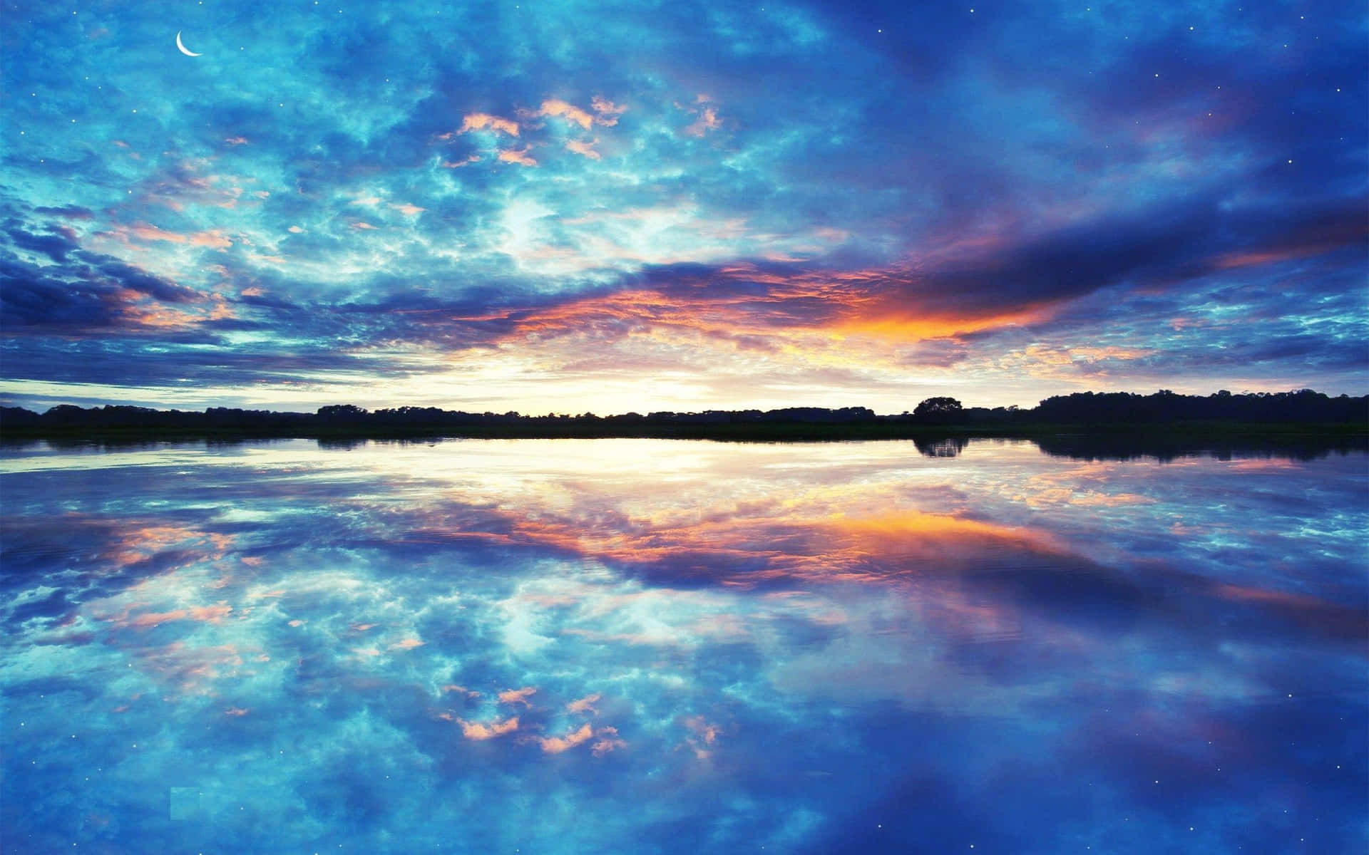 Mesmerizing Sunset Reflection on the Calm Waters Wallpaper