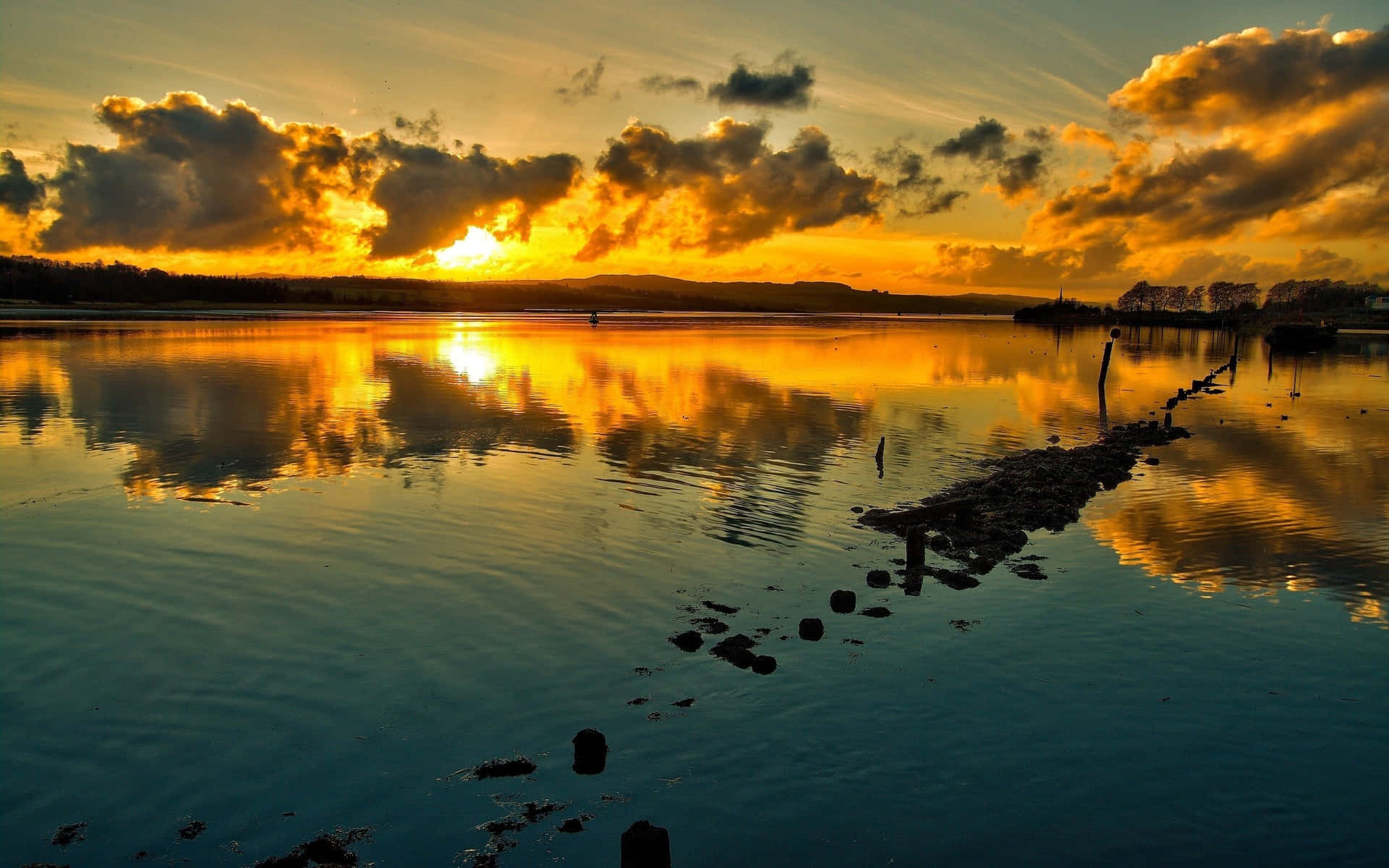 Captivating Sunset Reflection over Tranquil Waters Wallpaper