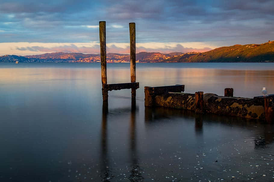 Sunset Reflectionsat Lower Hutt Wharf Wallpaper