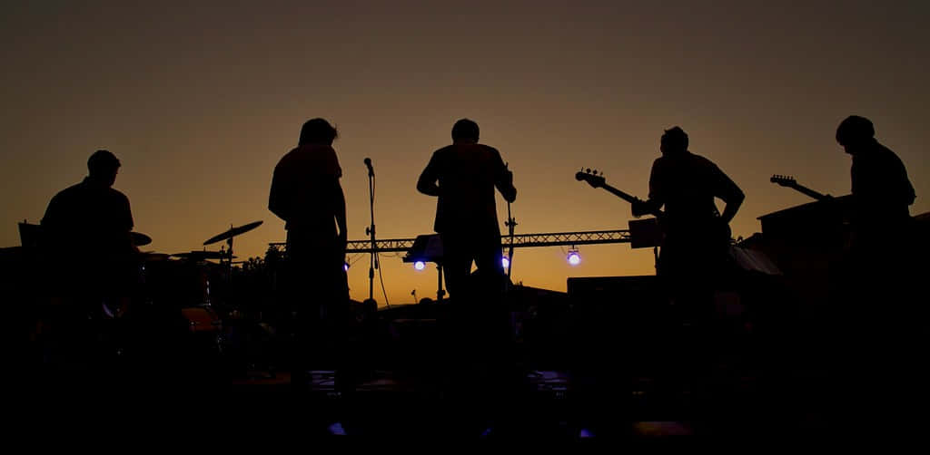 Sunset Silhouette Band Performance.jpg Wallpaper