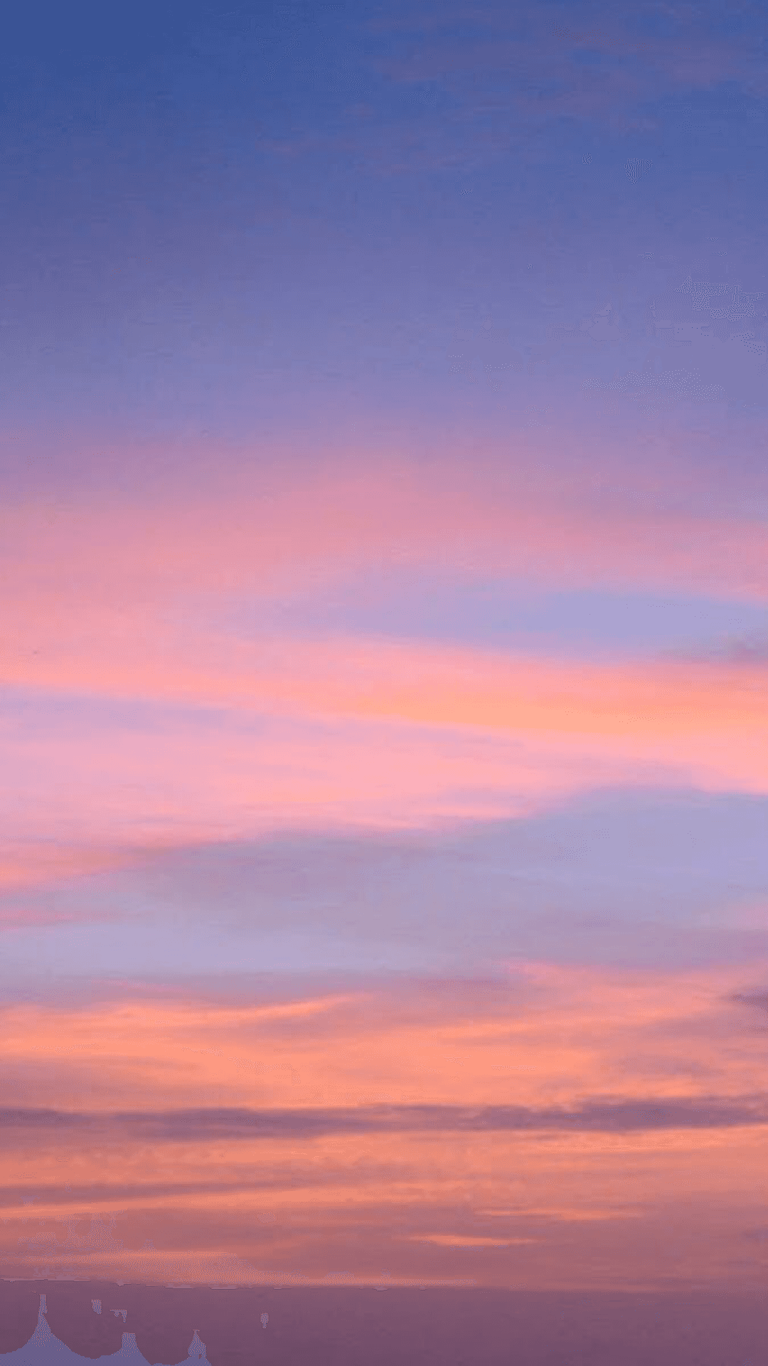 Enjoy a beautiful sunset sky, layered in pink and orange hues