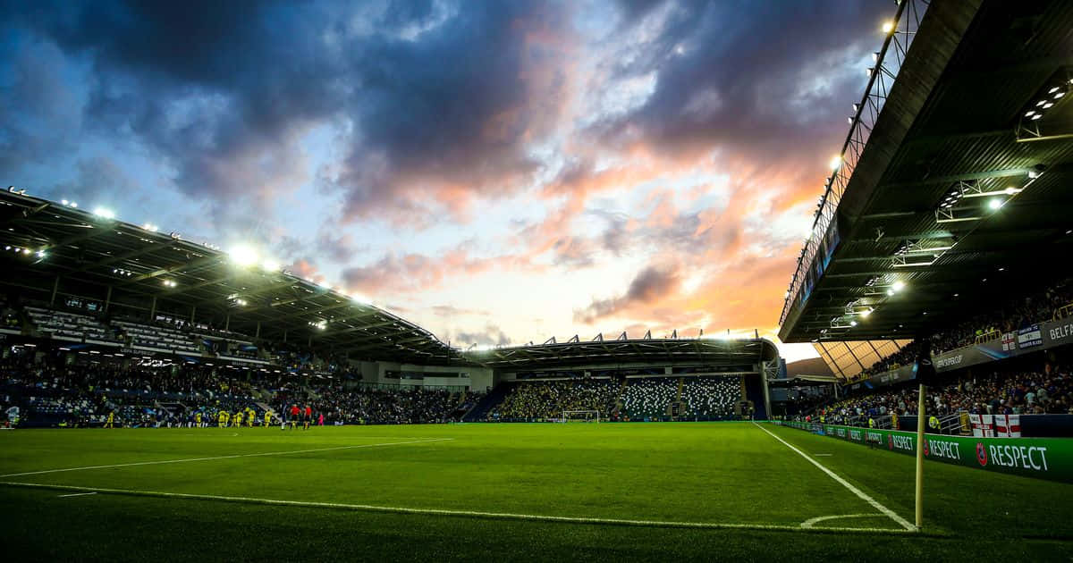 Sunset Skyover Football Stadium Wallpaper