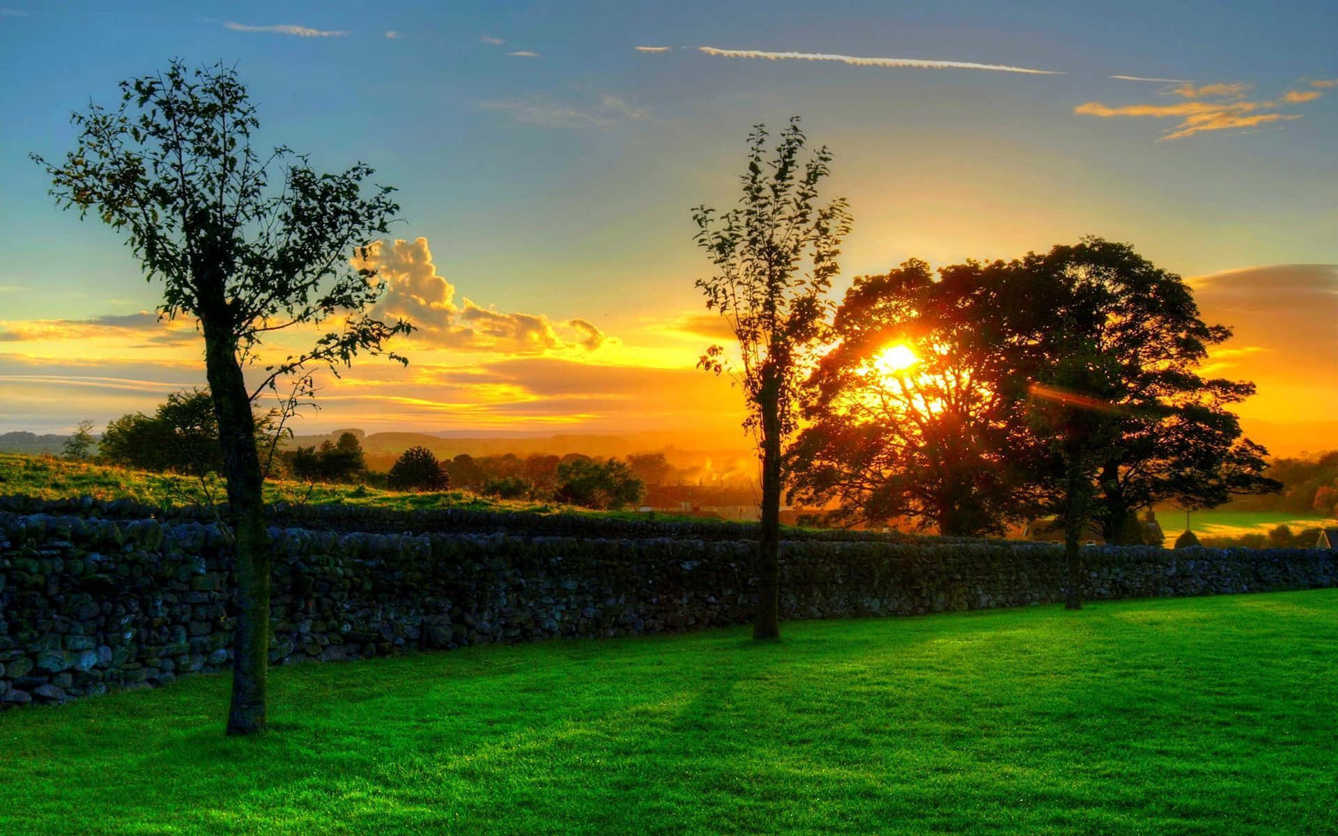 Enchanting Sunset View at a Picturesque Landscape Wallpaper