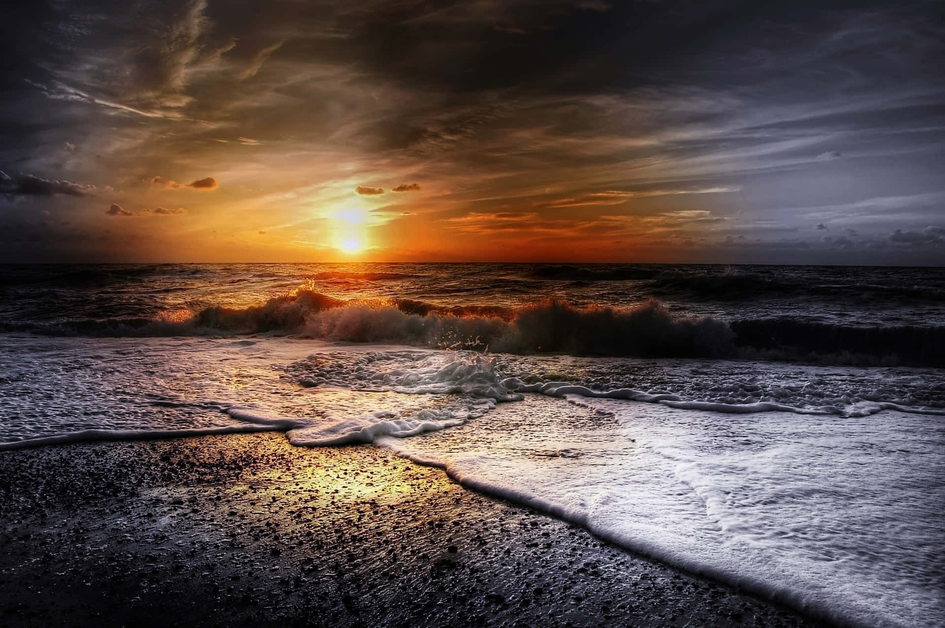Relax and watch the sunset waves roll in. Wallpaper