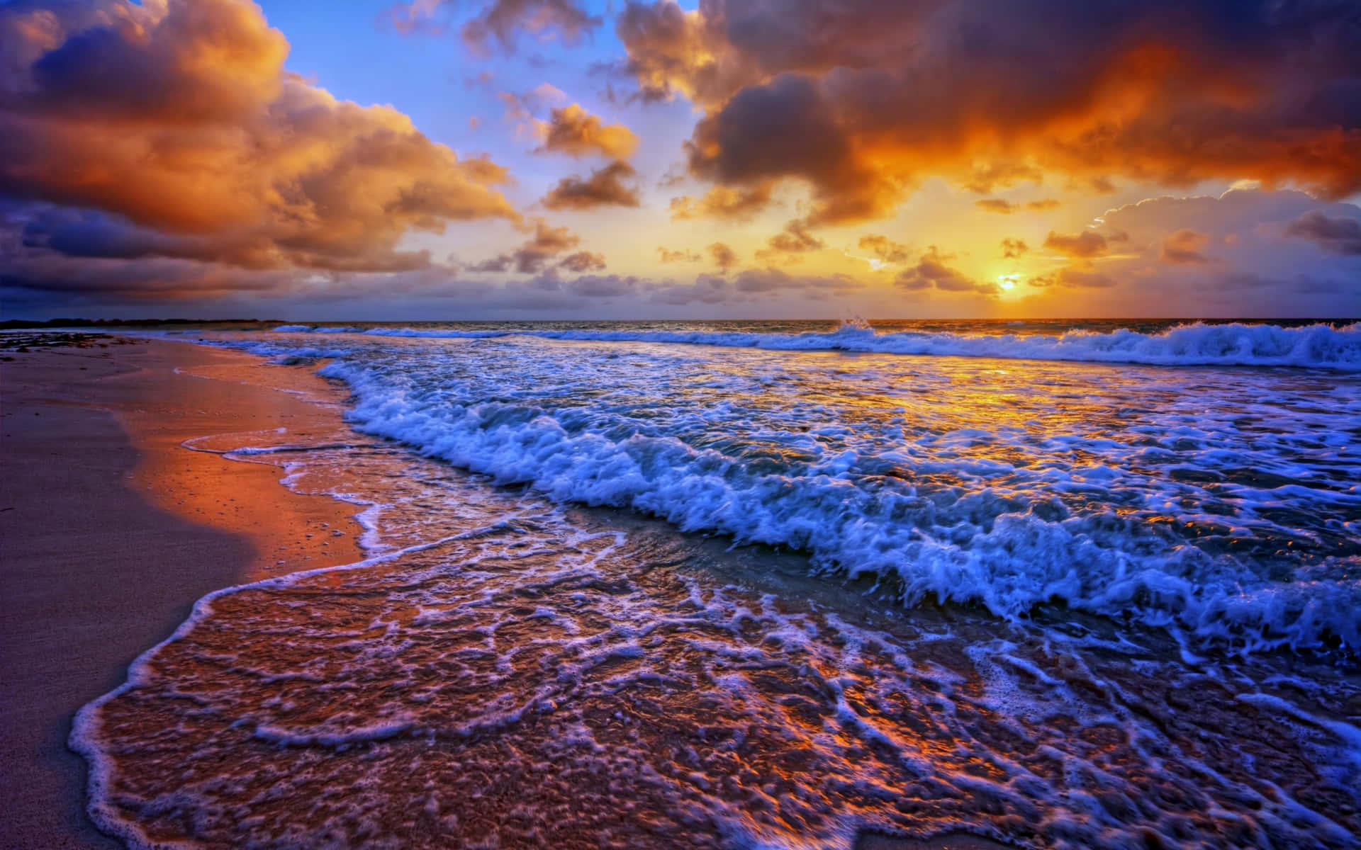 Enjoy the gentle colors of a sunset wave. Wallpaper
