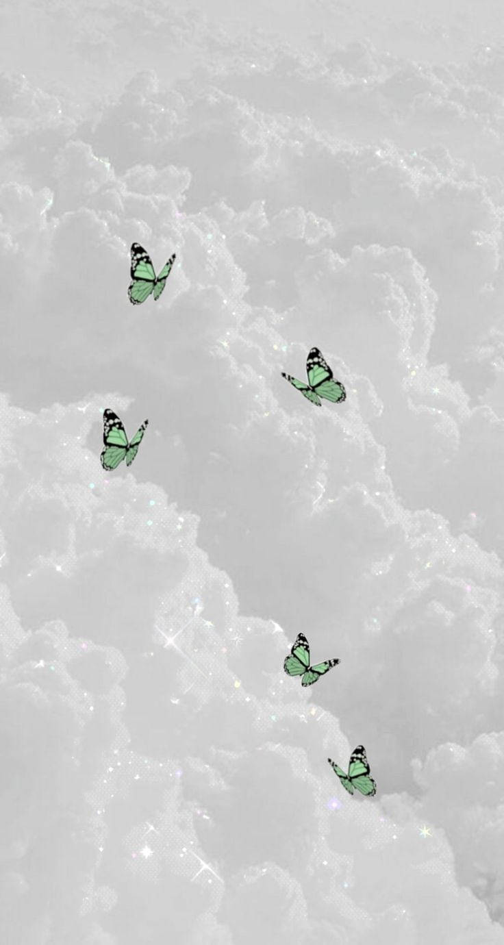Superlätta Gröna Fjärilar På Himlen. Wallpaper