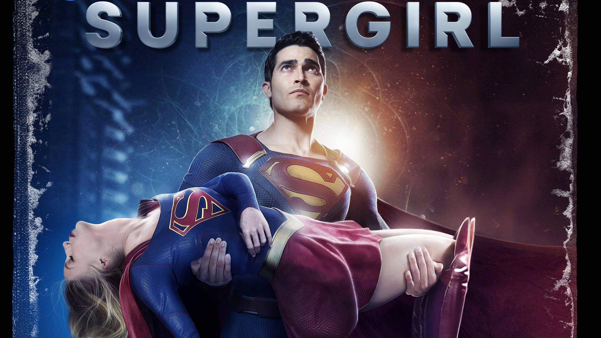 Superman Holding Unconscious Supergirl Background