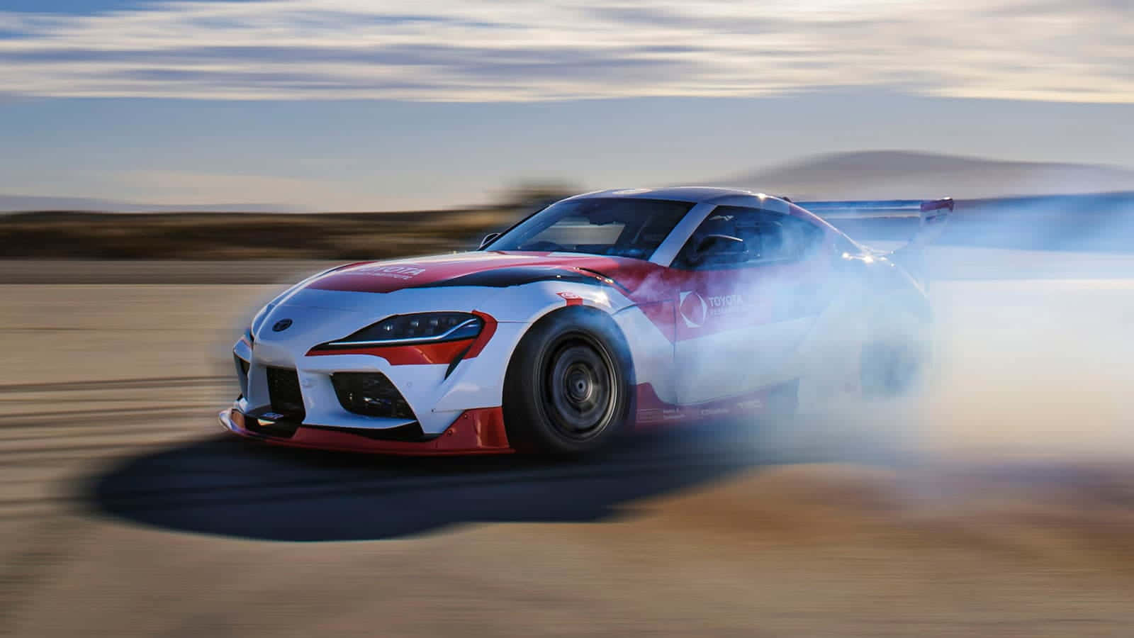 Speed through the roads with the Supra Drift Wallpaper