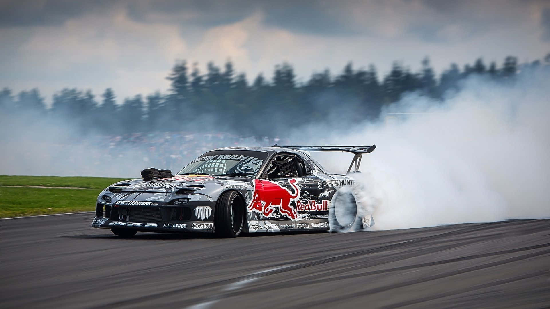 Experience the thrill of drifting with the powerful Toyota Supra. Wallpaper